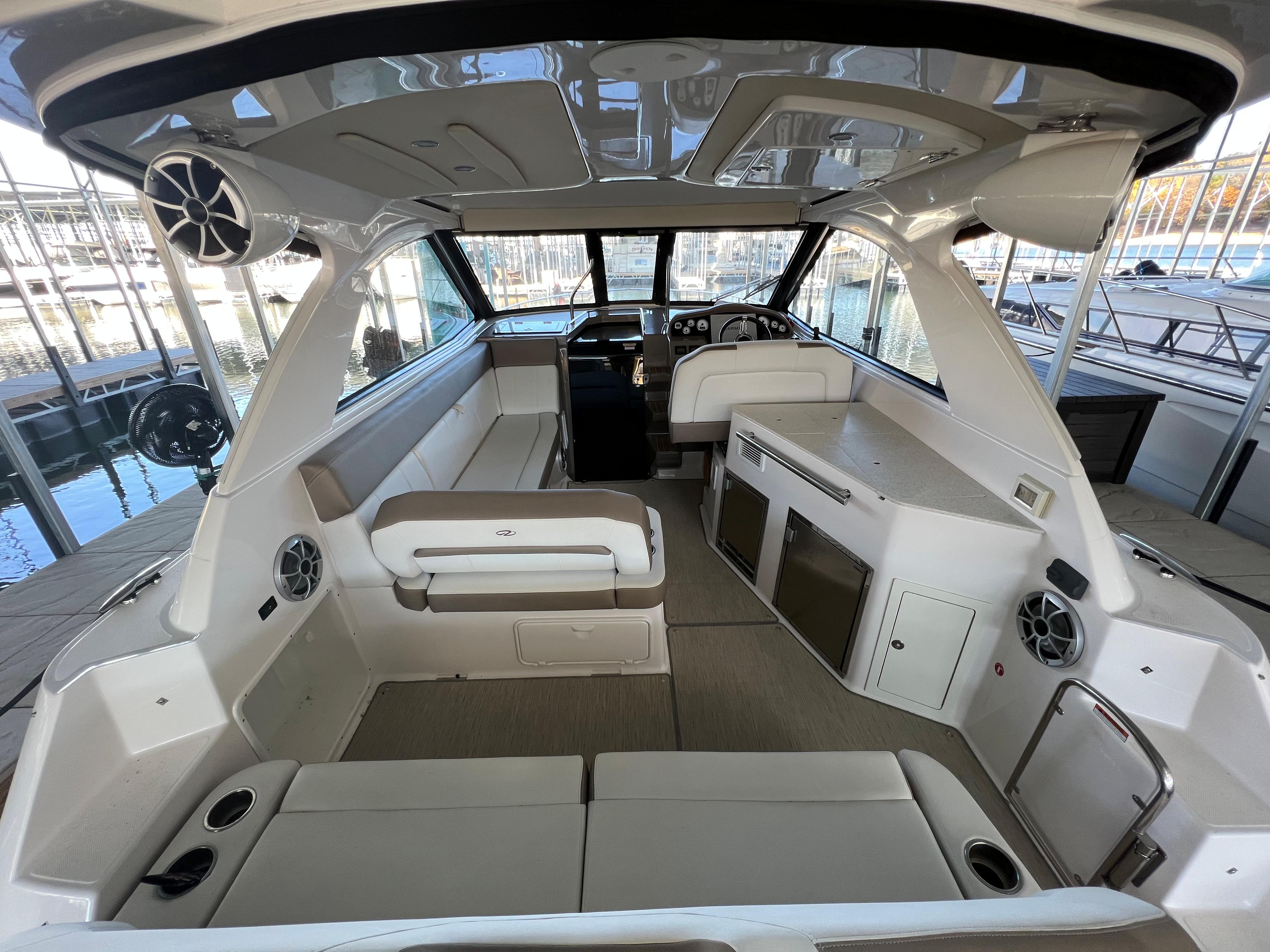 Interior of a 2017 Regal 35 Sport Coupe boat with seating and helm.