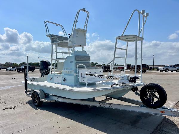 2022 Shallow Sport 20 Classic boat on trailer under a clear sky.