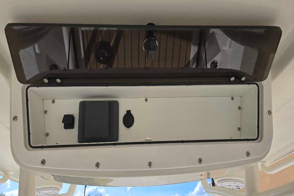 2025 Ranger 2360 Bay boat console with storage compartment and electrical outlets.