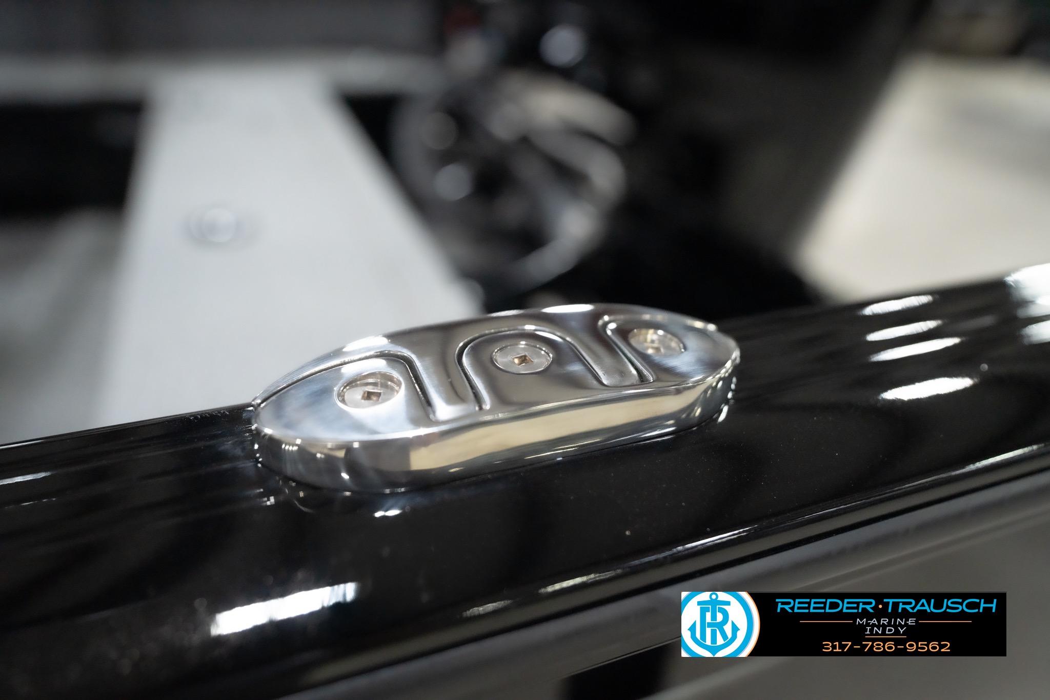 2026 Lund 1800 Explorer Sport boat detail with sleek chrome hardware.