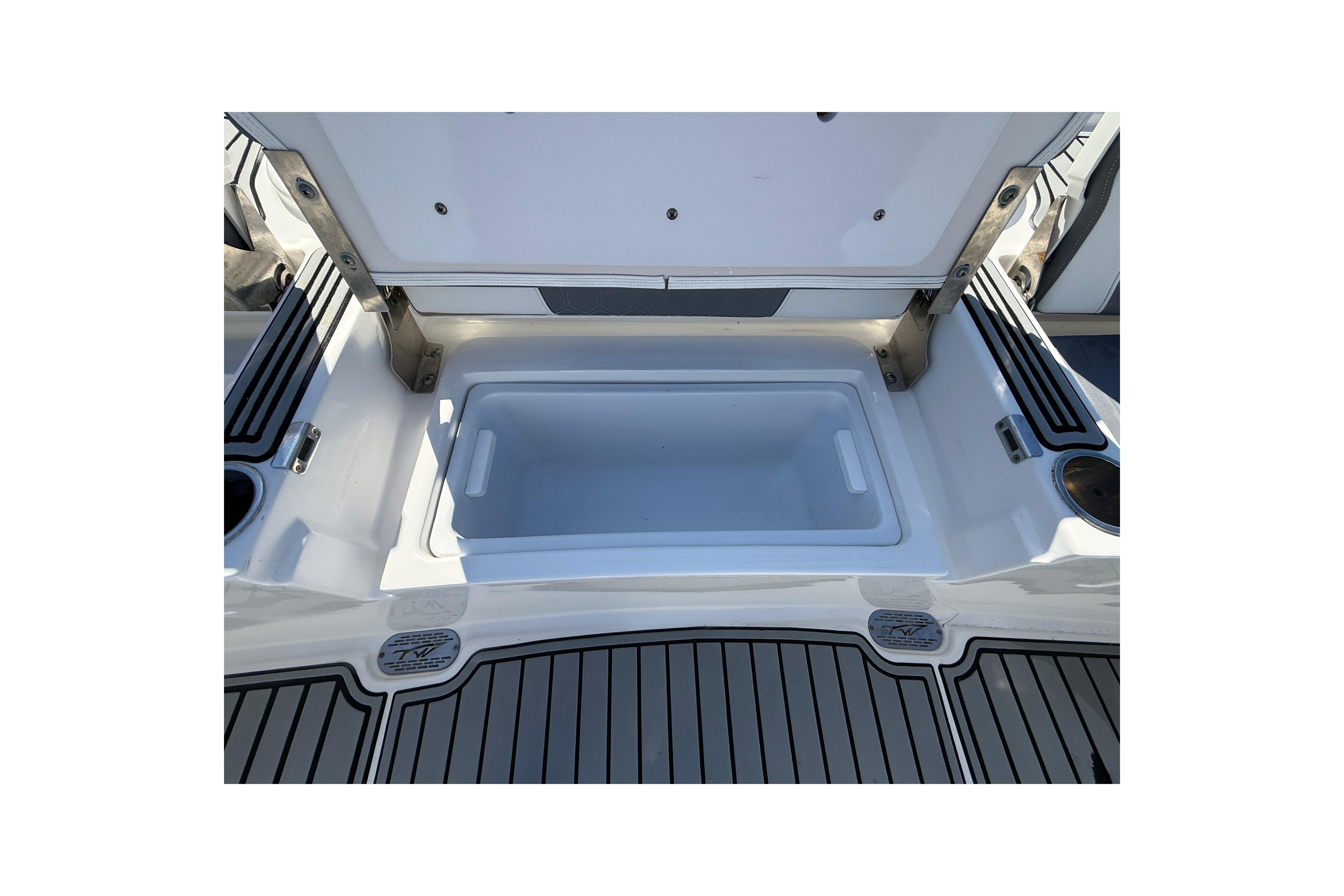 Open storage compartment on 2019 Tidewater 2700 Carolina Bay boat.
