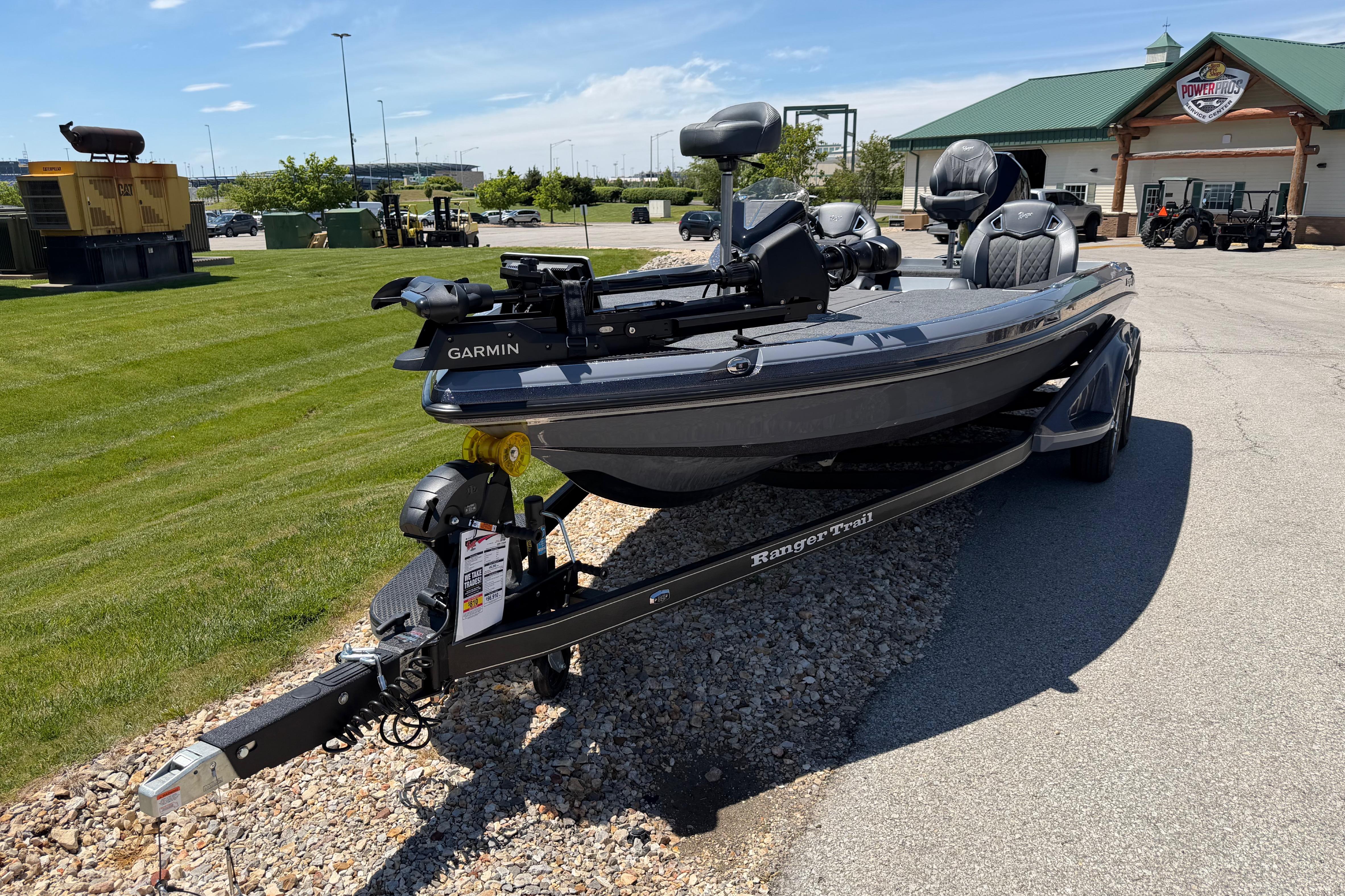 2026 Ranger Z520R boat on trailer, featuring Garmin equipment, parked outdoors.