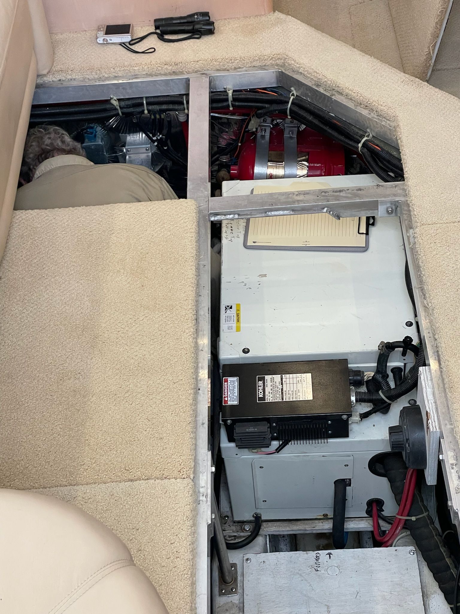 Engine compartment of 2000 Carver 356 Aft Cabin Yacht.