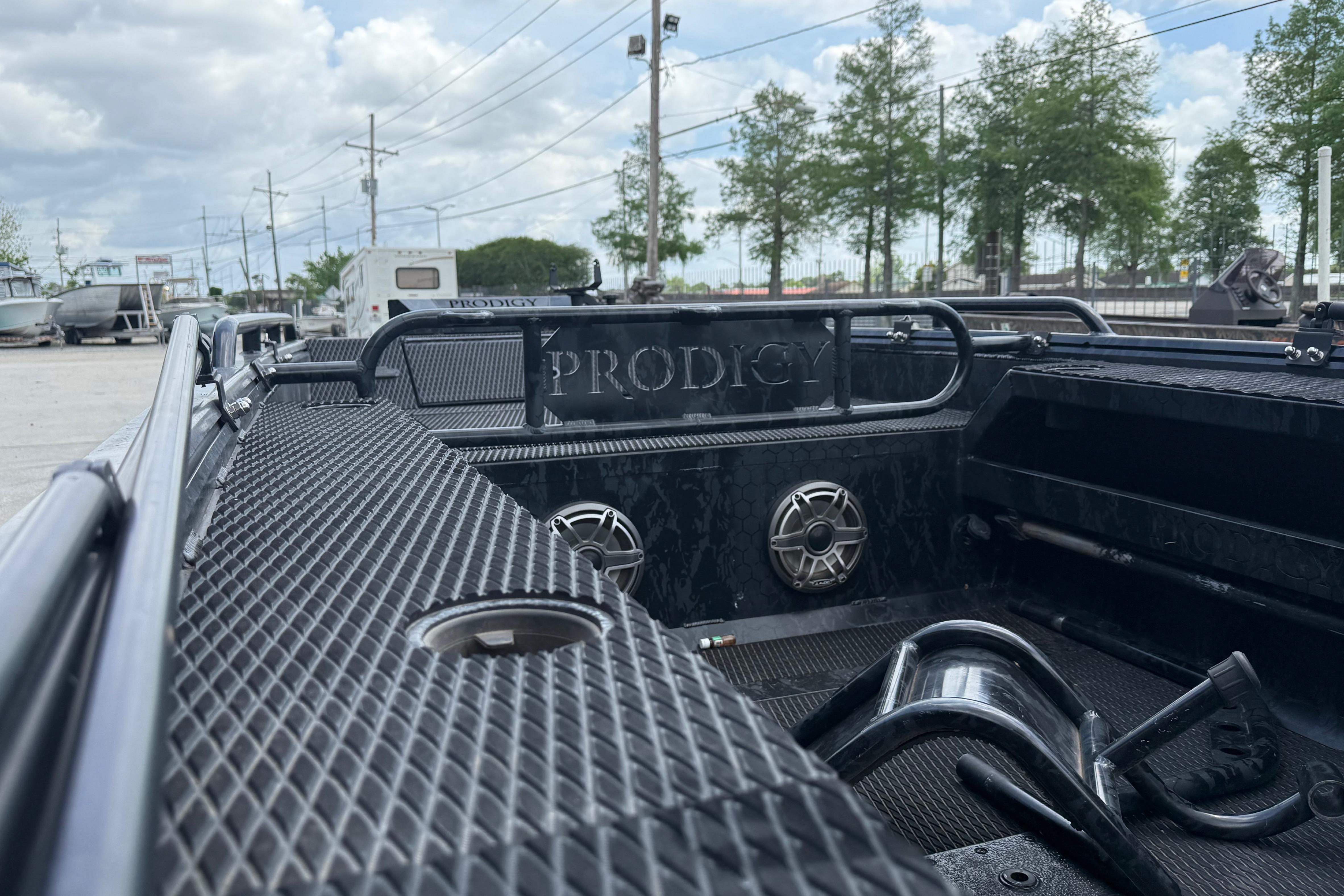 2024 Prodigy 17 boat interior with textured surfaces and speaker system.