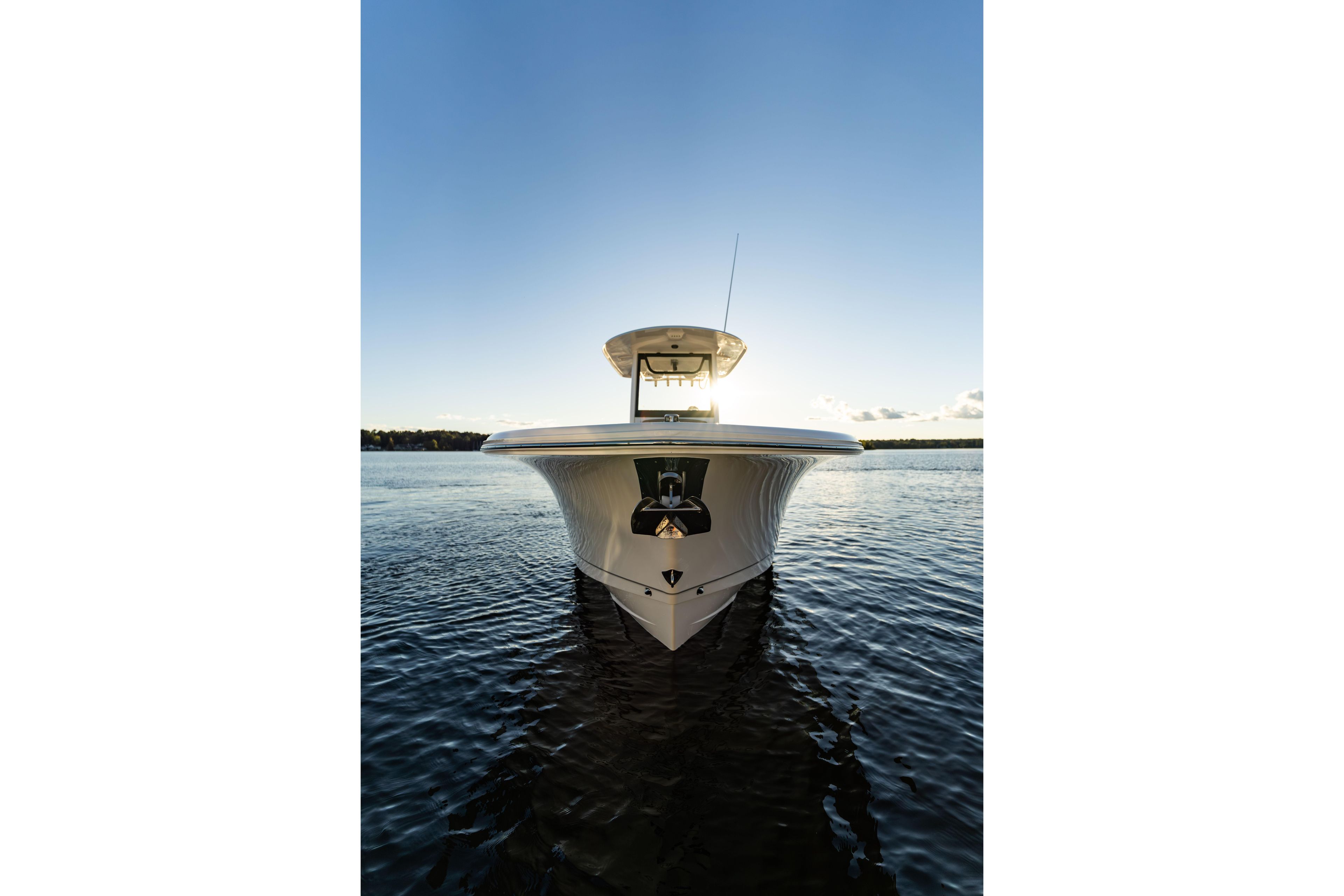 Front view of 2026 Sea Hunt Ultra 275 Coffin Box boat on calm water.