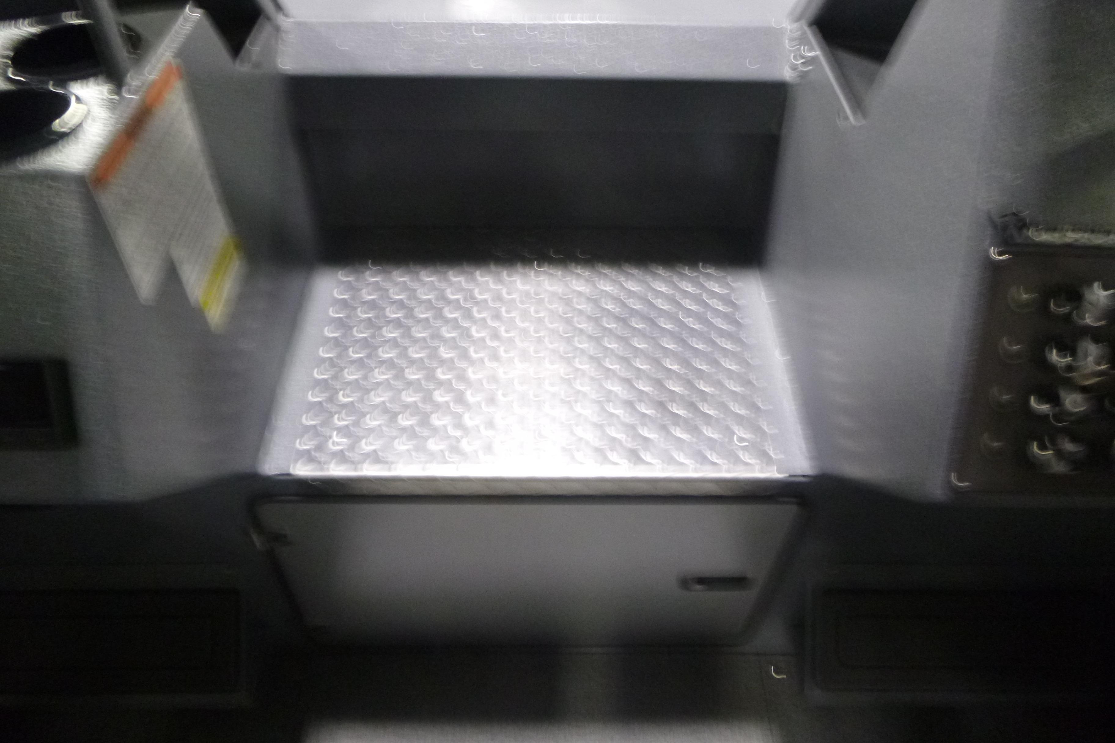 Interior of 2026 KingFisher 2425 Escape HT boat, featuring a metallic step.