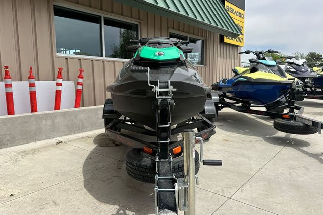 A 2026 Sea-Doo PWC GTR 230 on a trailer in front of a building.