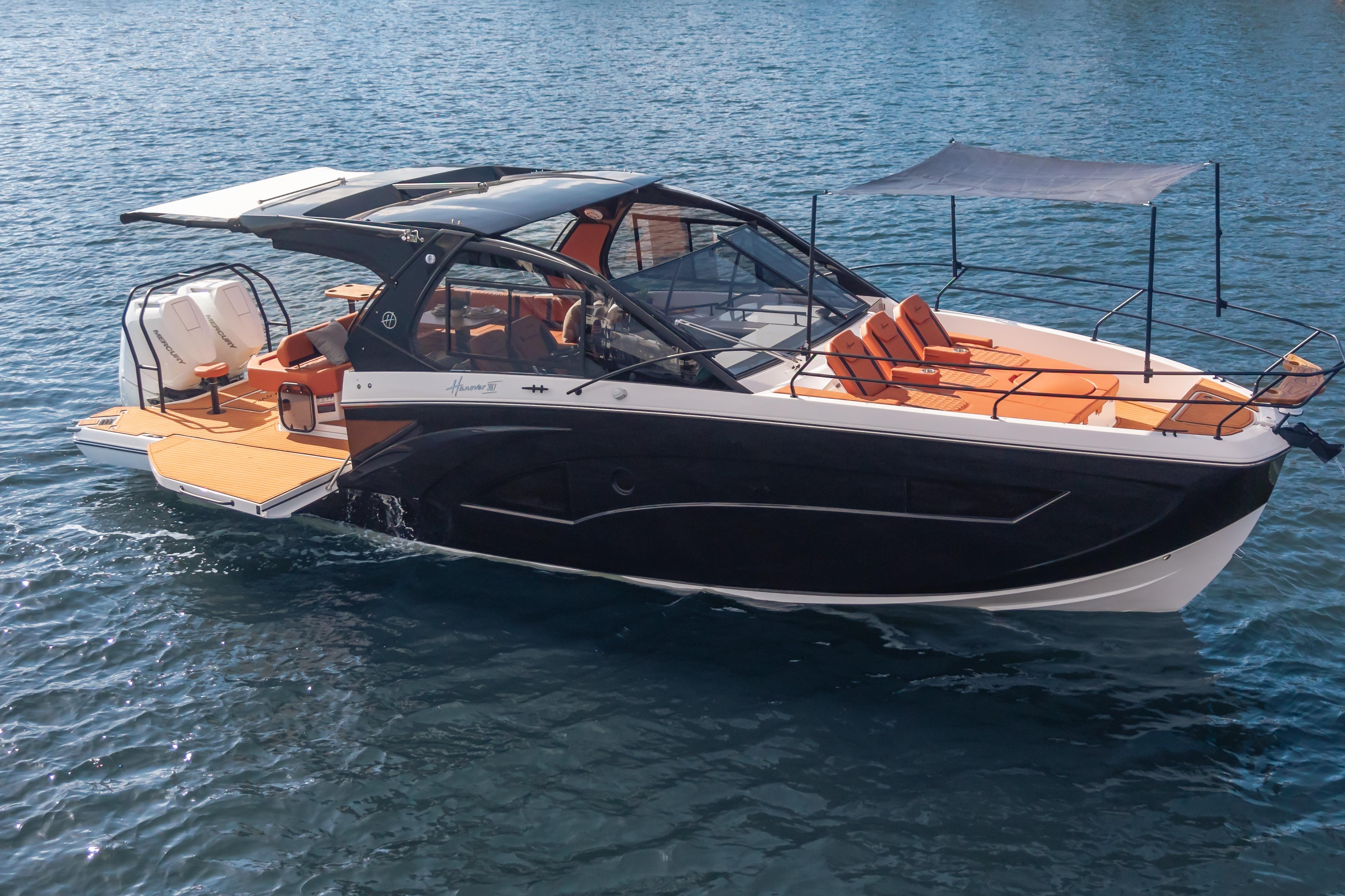Luxury Hanover 387 boat, 2026 model, cruising on serene blue waters.