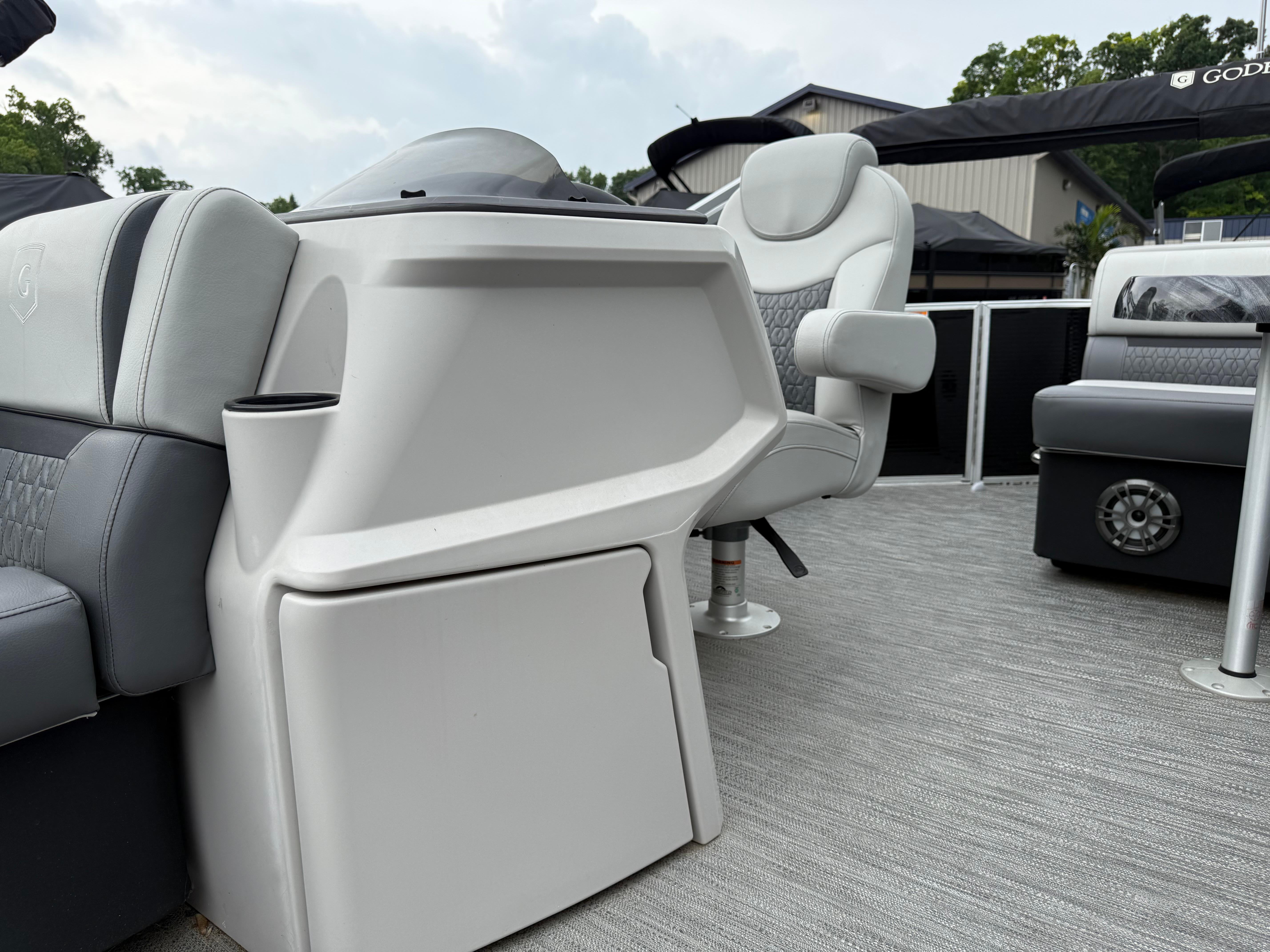 2023 Godfrey Sweetwater boat interior with modern seating and console design.