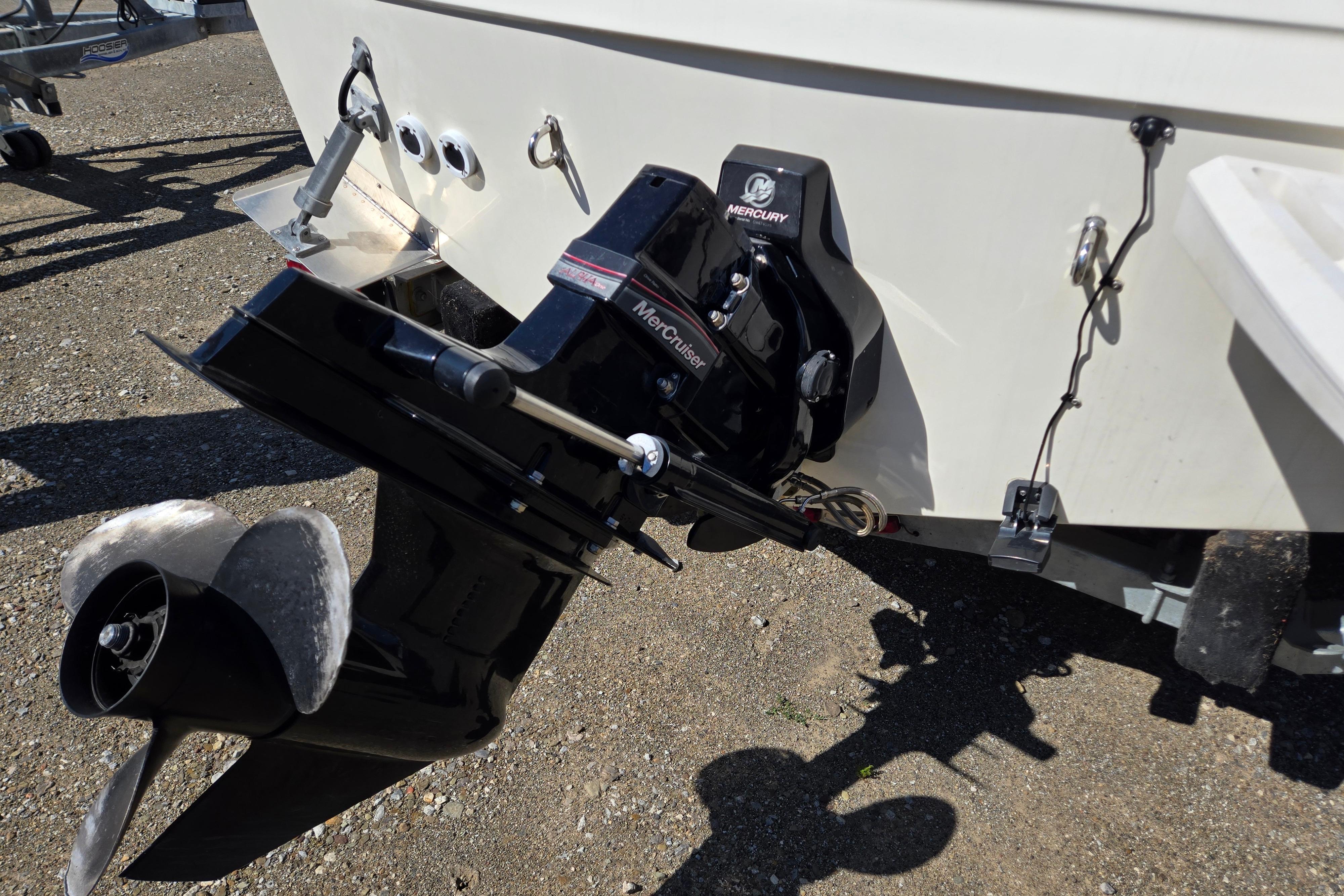 2006 Bayliner 222 Classic boat with Mercury MerCruiser engine, rear view.