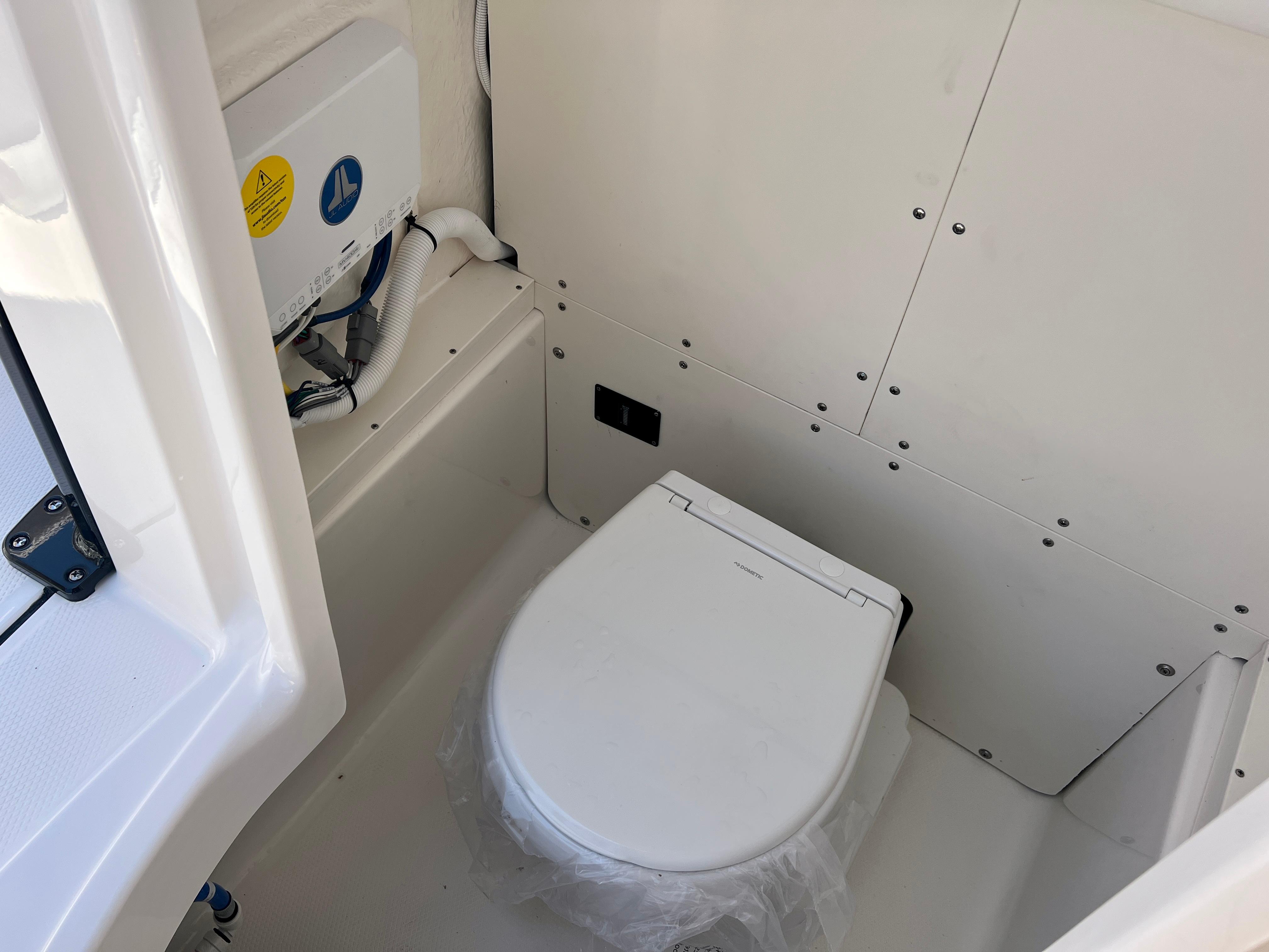 Interior of 2025 Robalo 266 Cayman featuring a toilet.