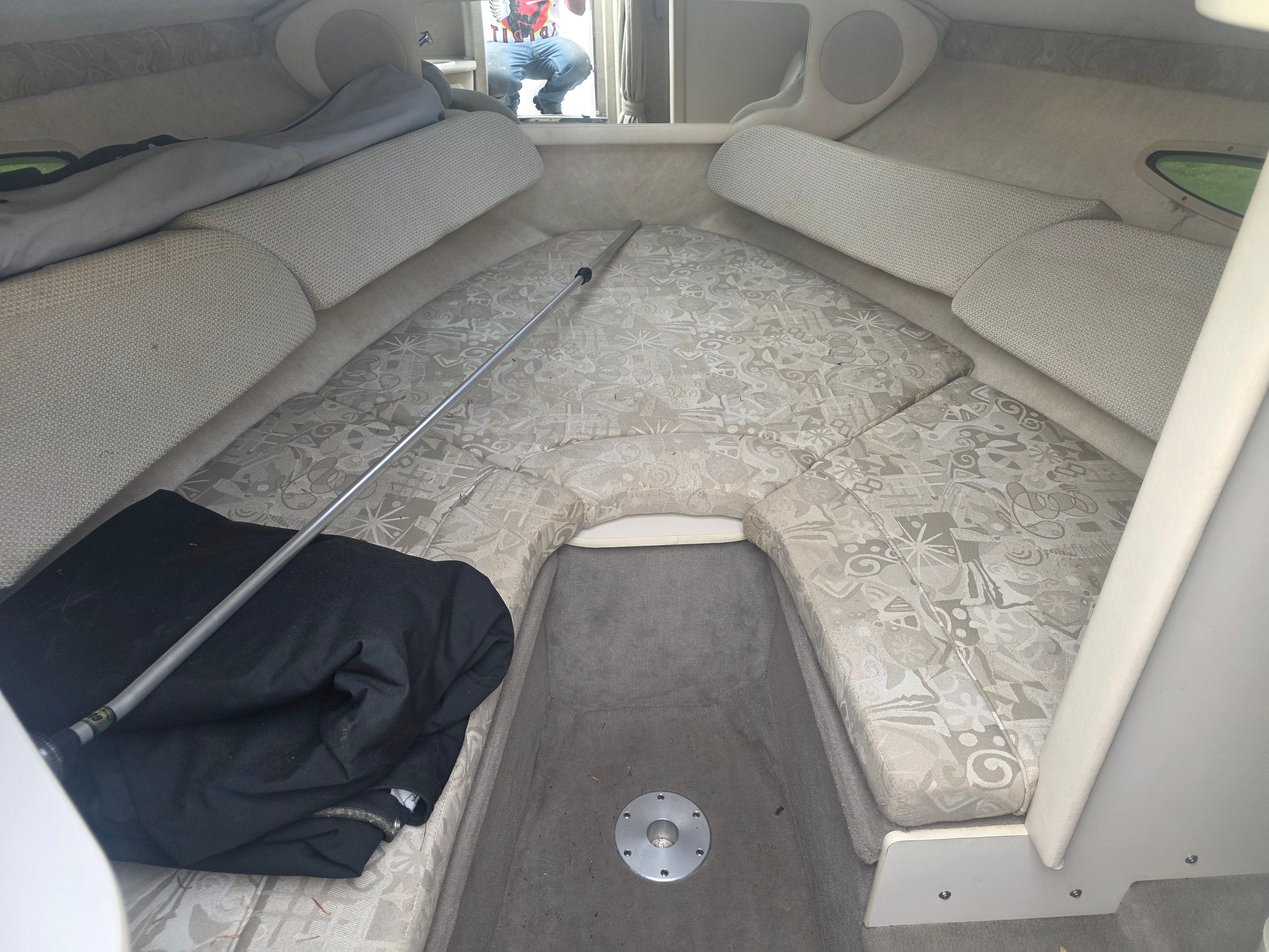 Interior of 2004 Sea Ray 225 Weekender with upholstery.