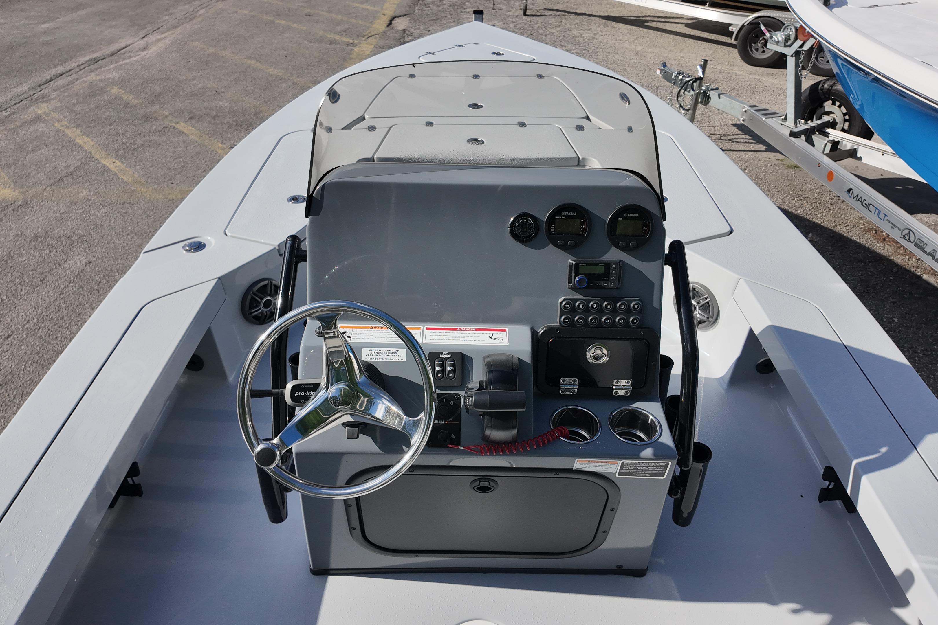 2026 Blazer Bay 675 Ultimate Bay boat dashboard with steering wheel and controls.