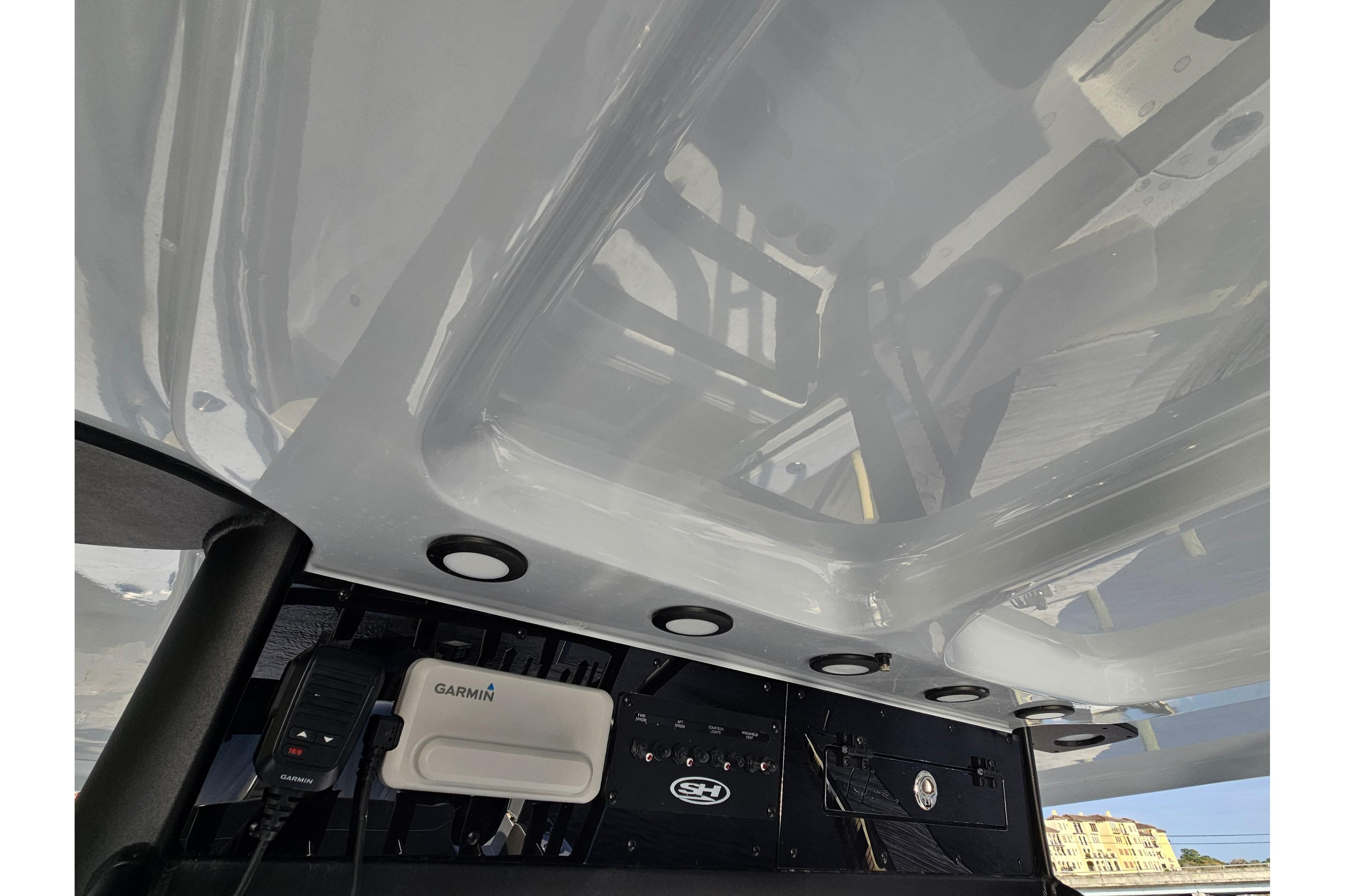 2026 Sea Hunt Ultra 285 SE boat interior with Garmin electronics and sleek design.