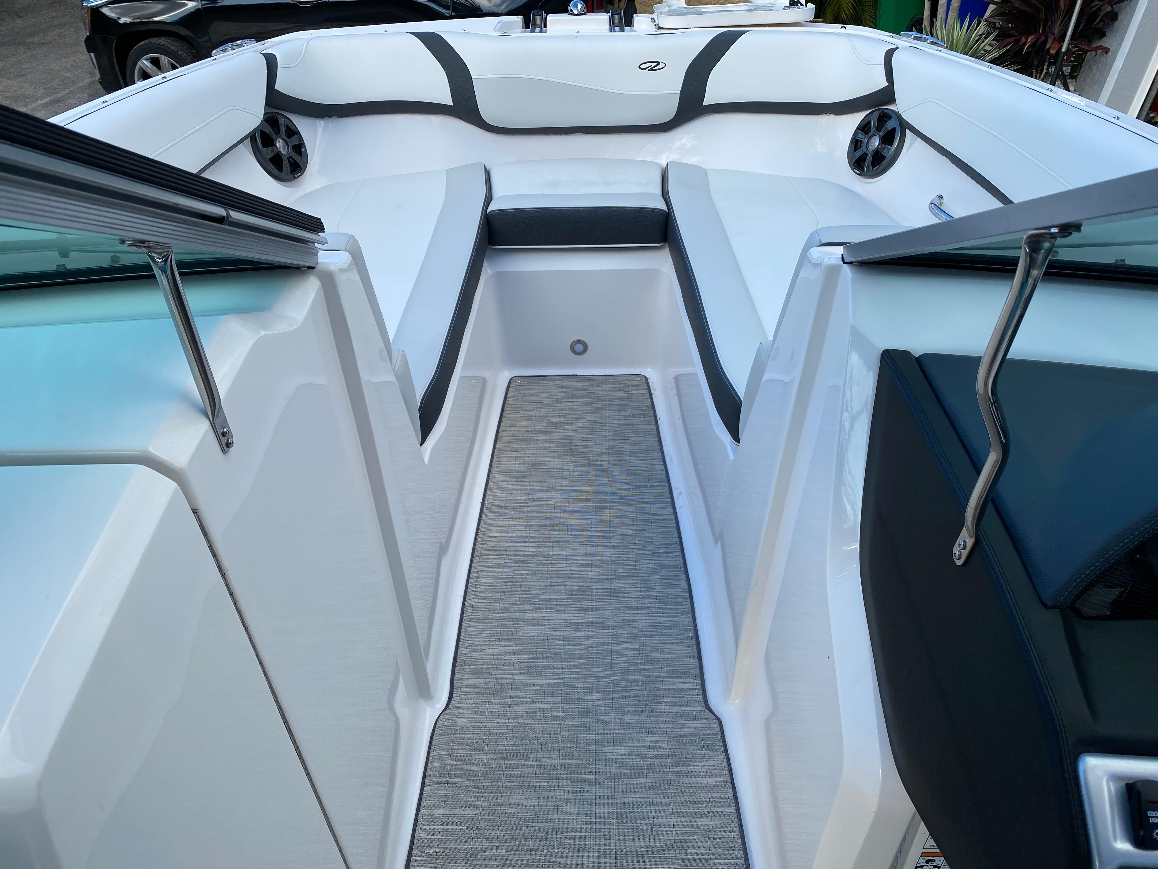 2017 Regal 22 FasDeck boat interior with white and gray seating.