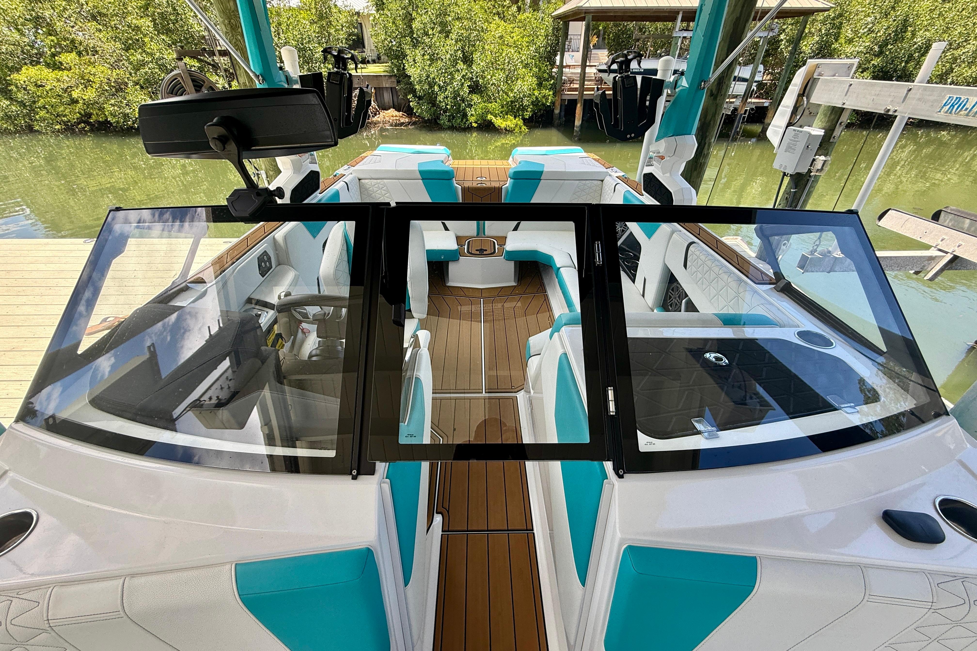 2024 Nautique Super Air Nautique GS20 boat interior with teal accents and sleek design.
