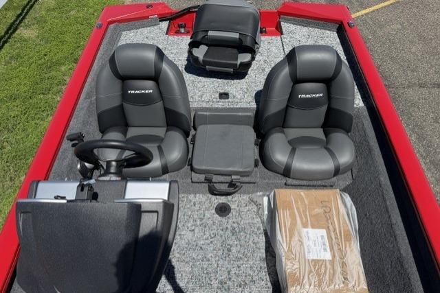 2026 Tracker Pro Team 175 boat interior with dual seats and steering console.