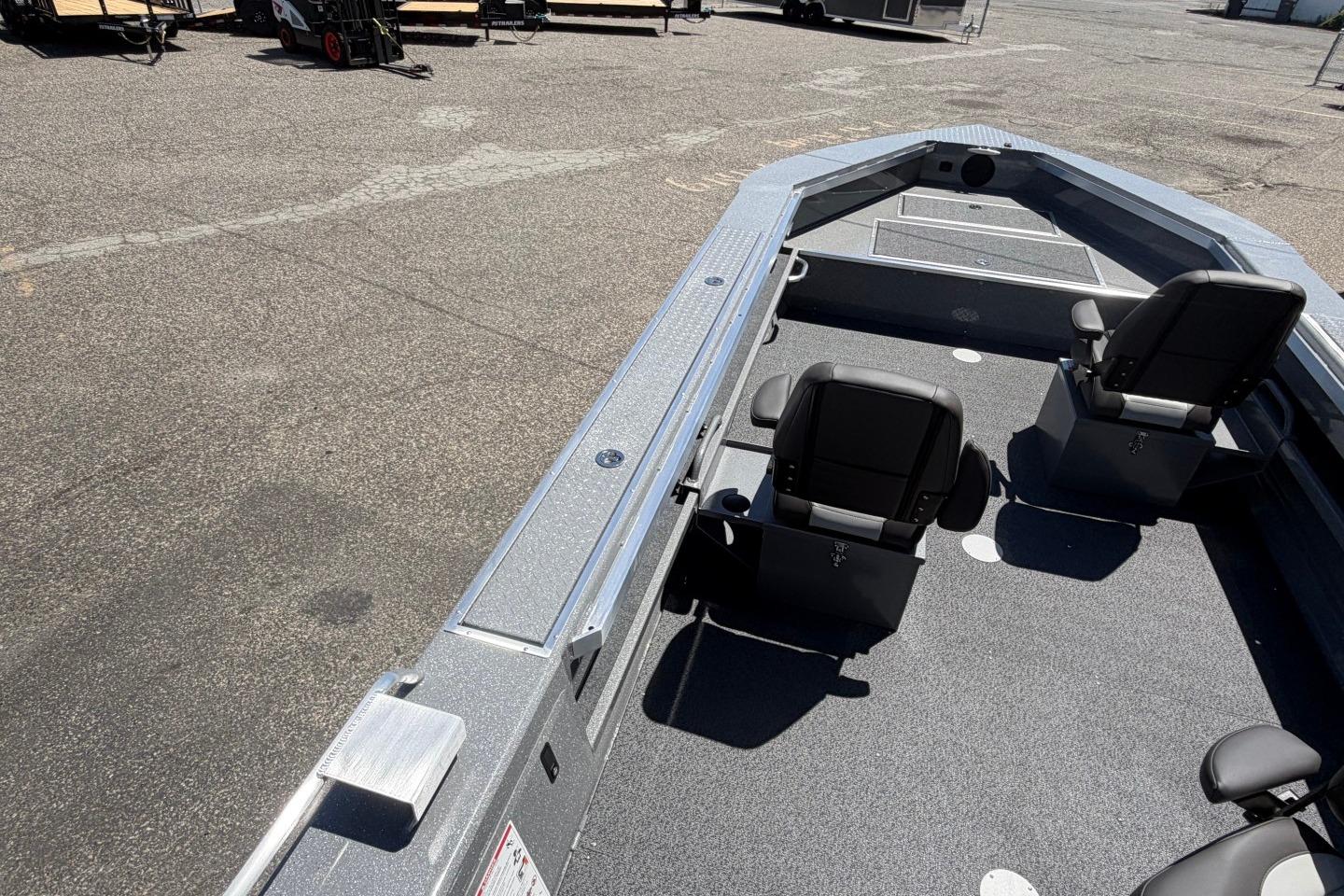 2026 Thunder Jet 209 Rush OT boat interior with seating and spacious deck.
