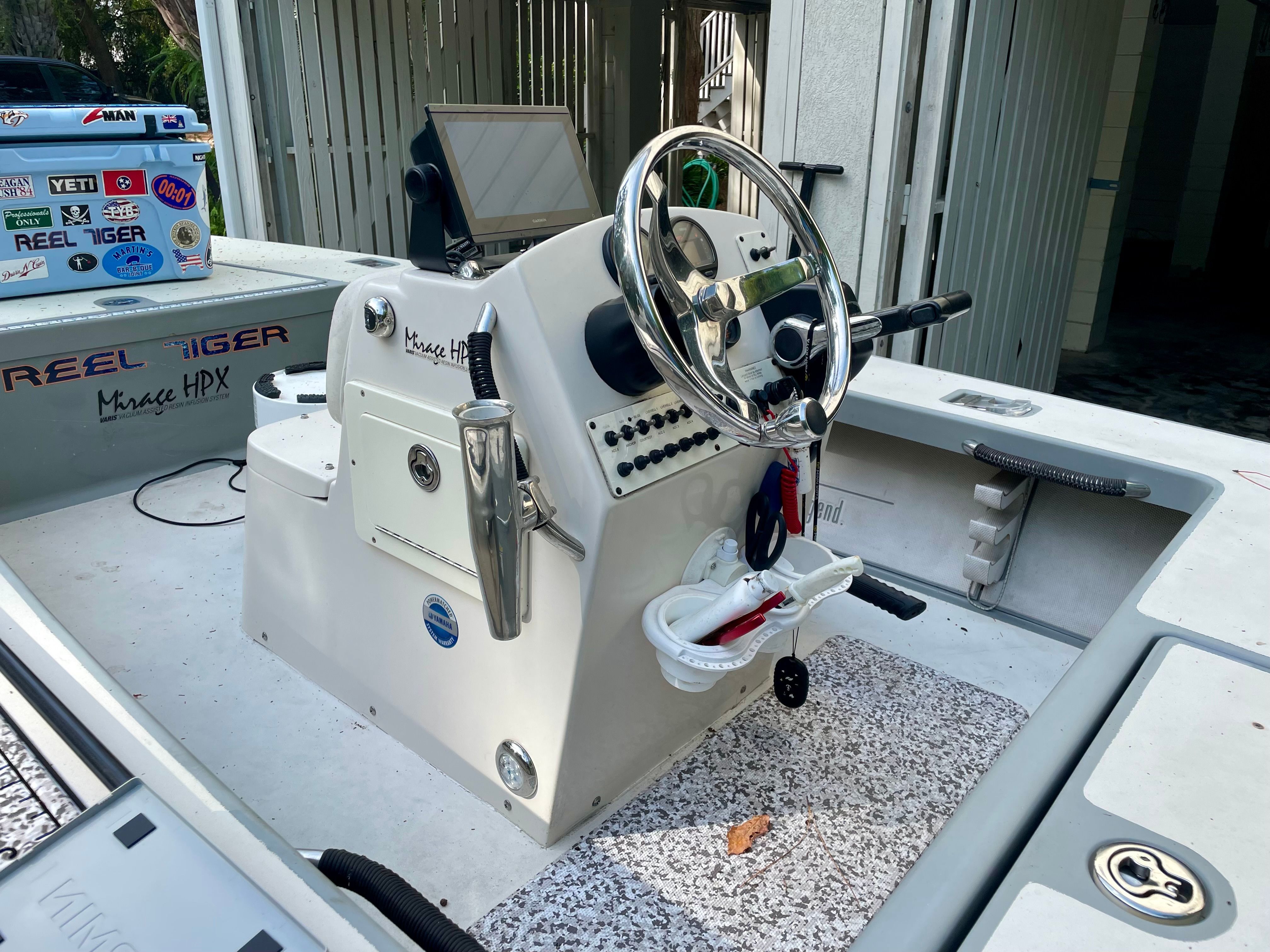 2009 Maverick Mirage 17 HPX boat console with steering wheel and controls.