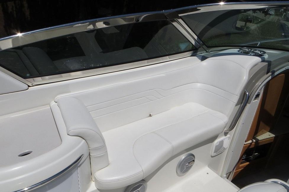 2003 Formula 330 Sun Sport boat interior with white seating and sleek design.