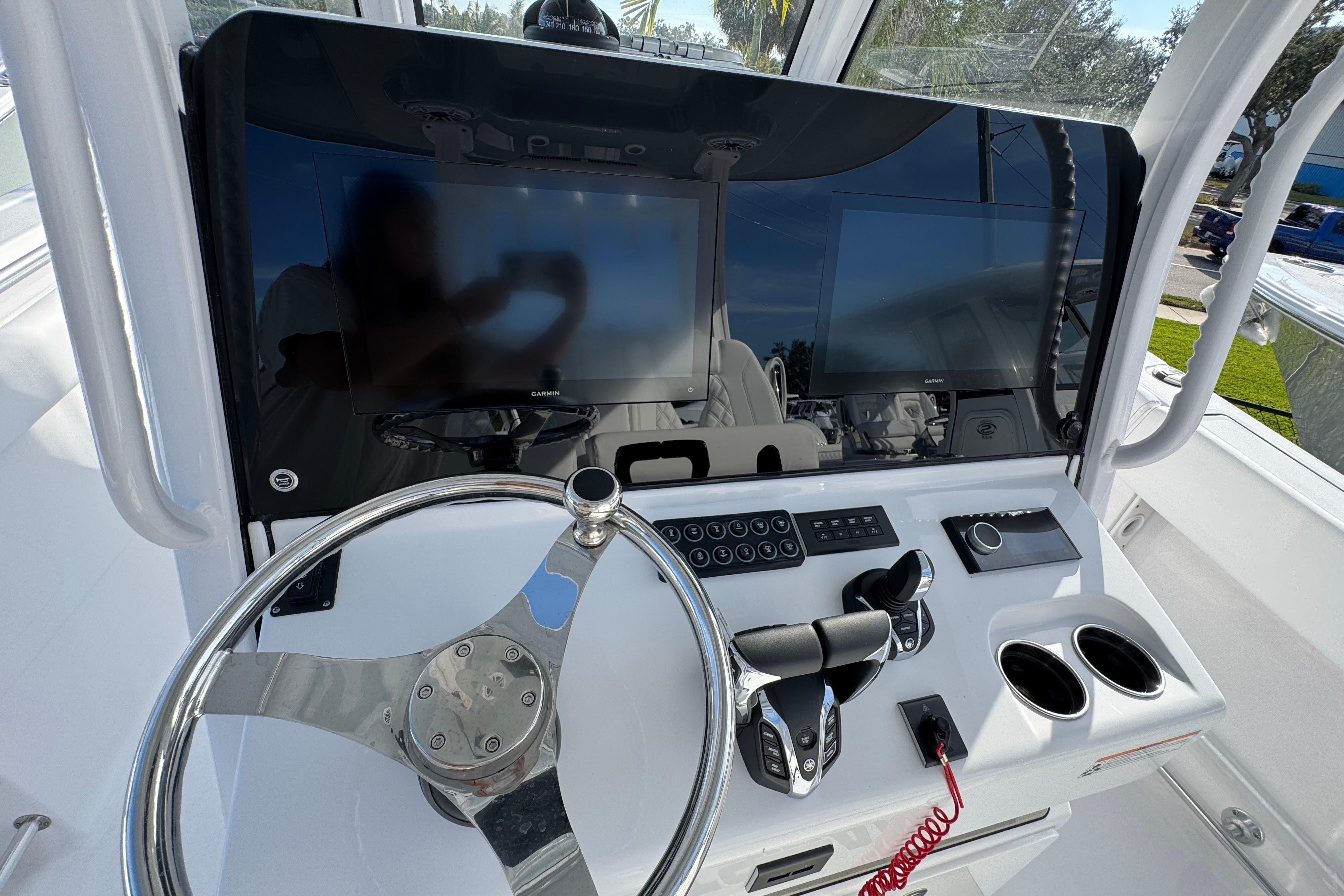 2026 Sportsman Open 302 Center Console helm with modern controls and dual displays.