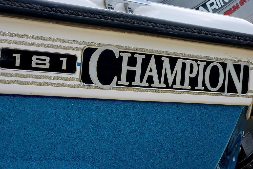 1996 Champion 181 SX boat logo on blue and white surface.