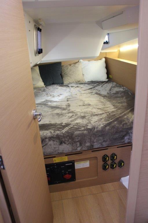 Cozy cabin interior of 2024 Jeanneau Sun Odyssey 490 sailboat.