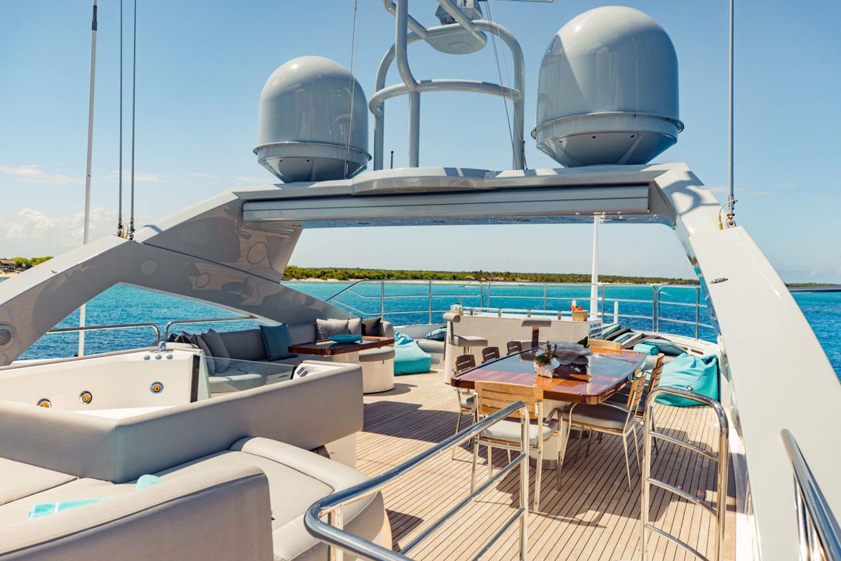 Luxurious Sunseeker 131 Yacht deck with seating and dining area, 2012 model.