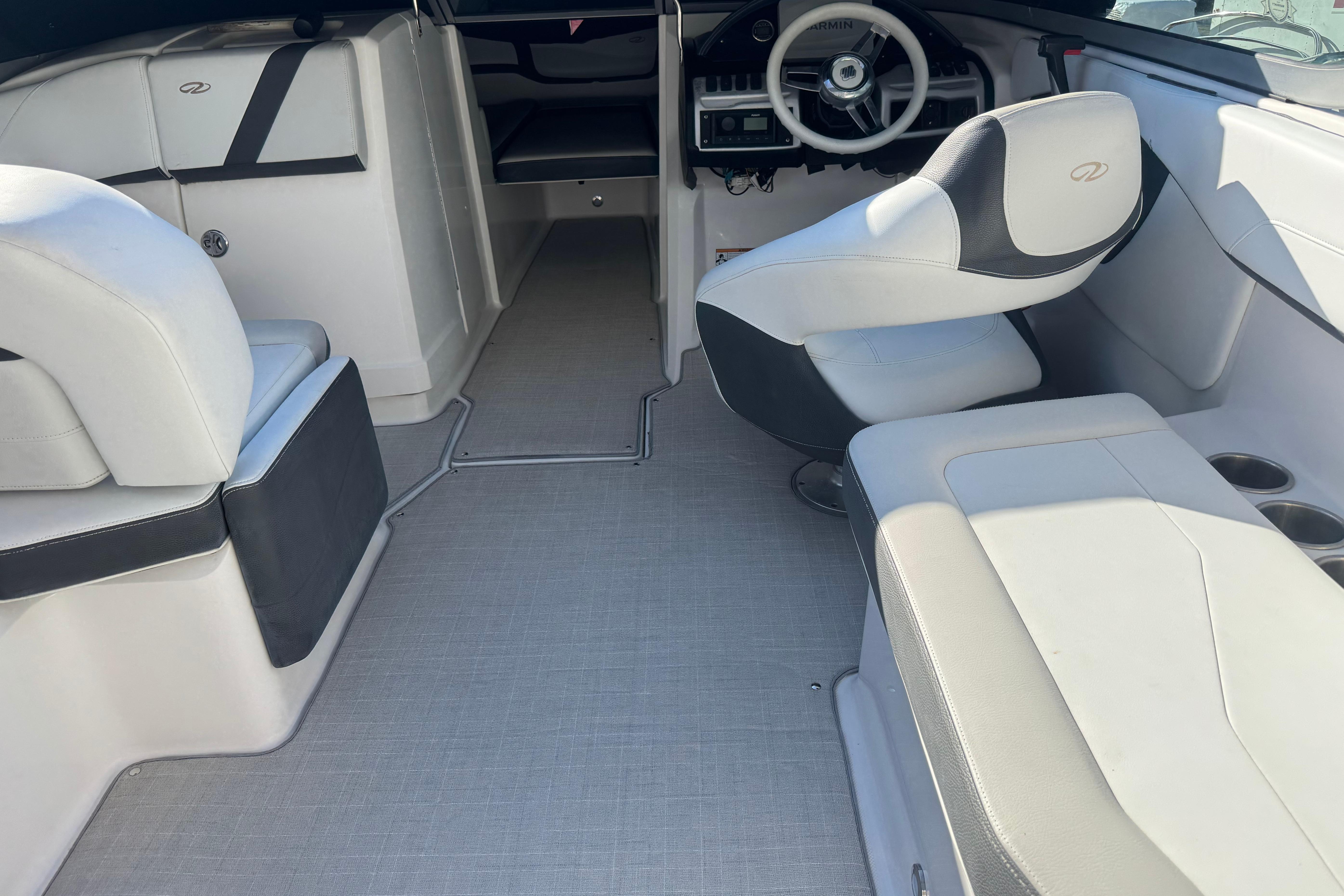 Interior of a 2017 Regal 23 OBX boat with modern seating and steering wheel.