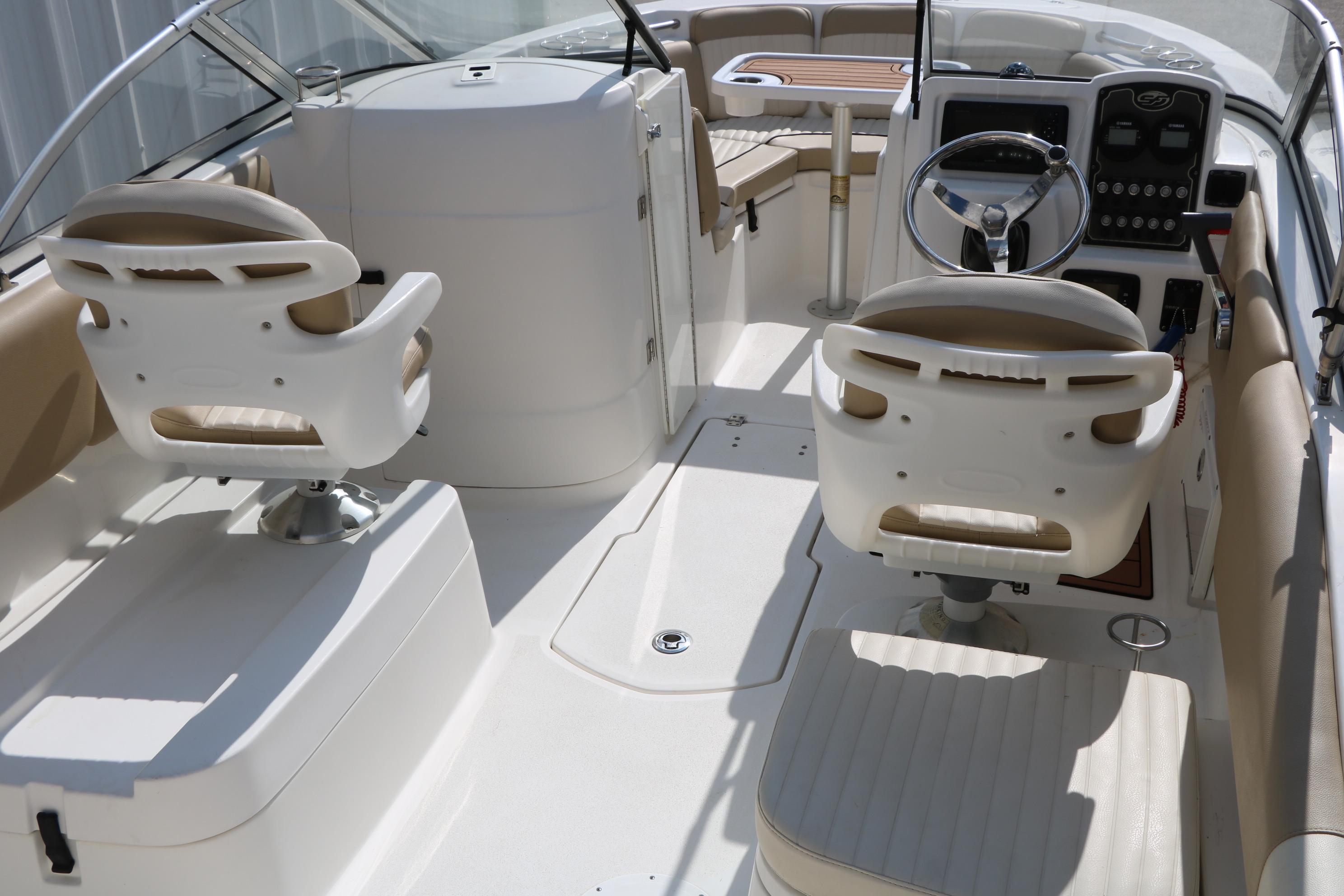 2017 Sea Fox 226 Traveler boat interior with helm, seating, and steering wheel.