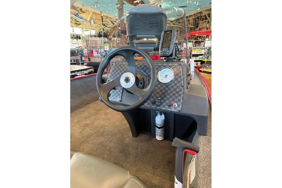 2025 Tracker Bass Tracker Classic XL boat dashboard with steering wheel and gauges.