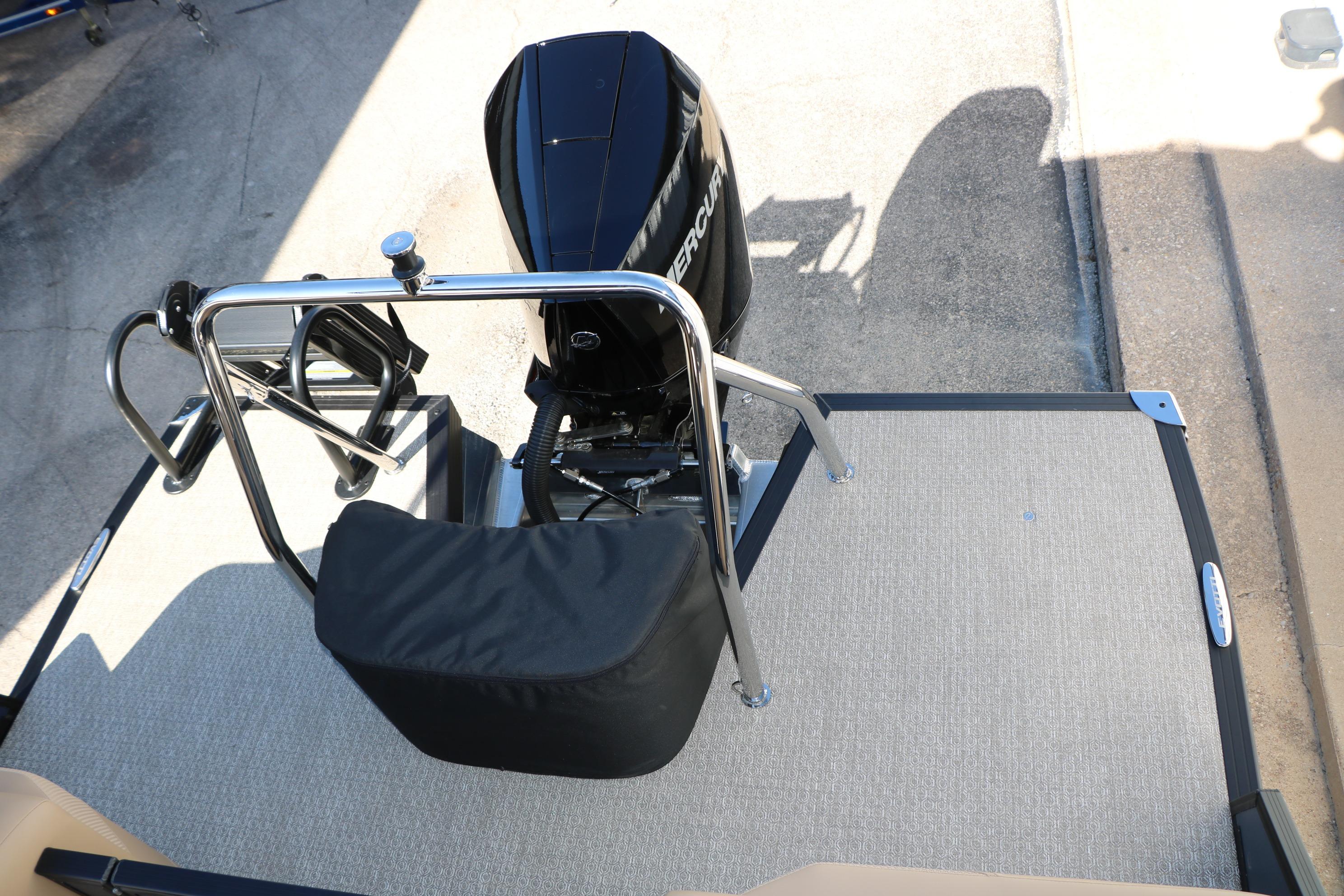 Rear view of 2026 Evotti 525 QL Tri-Toon boat with Mercury outboard motor.