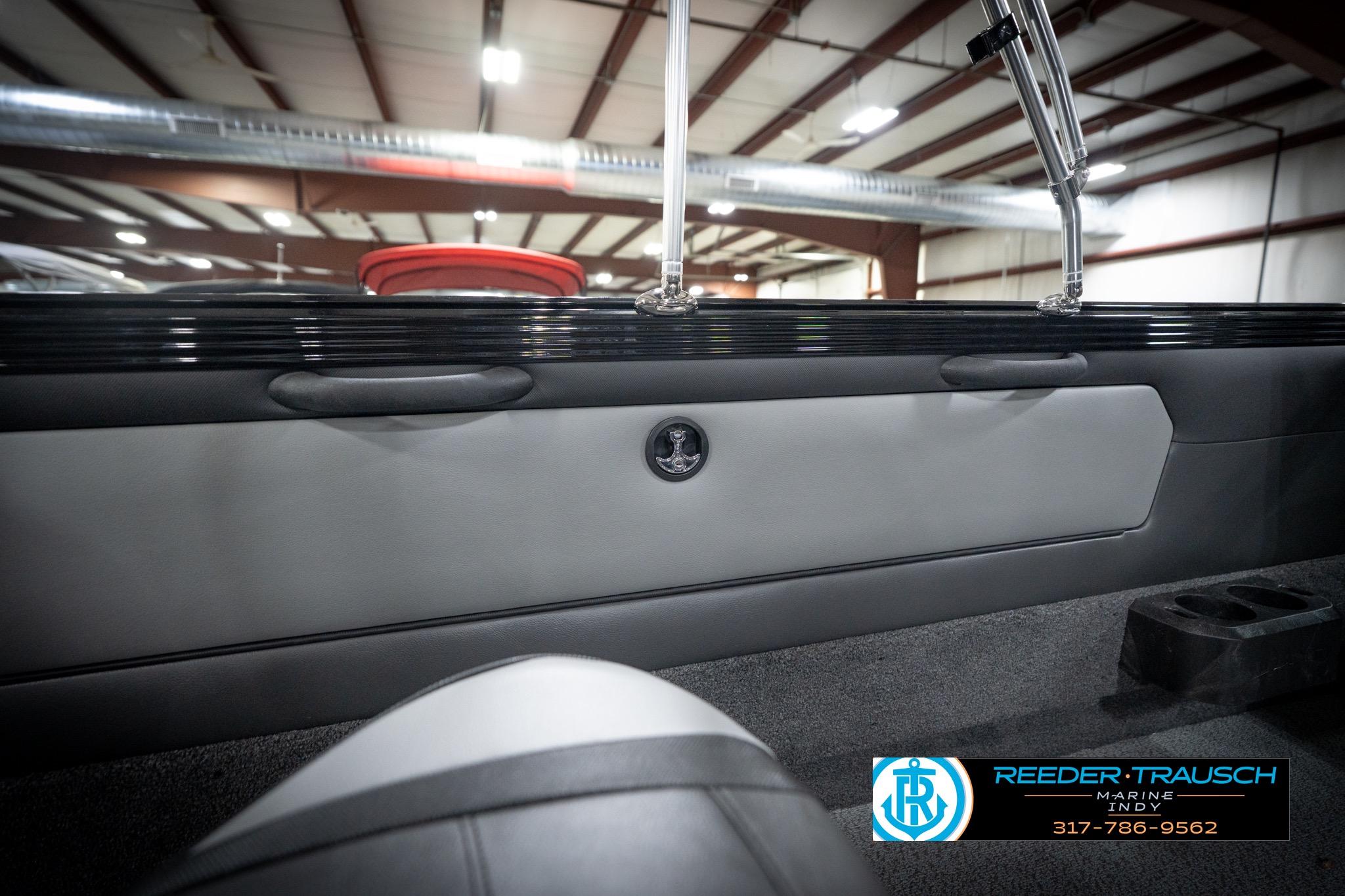 Interior view of 2026 Lund 2275 Baron boat at Reeder-Trausch Marine showroom.