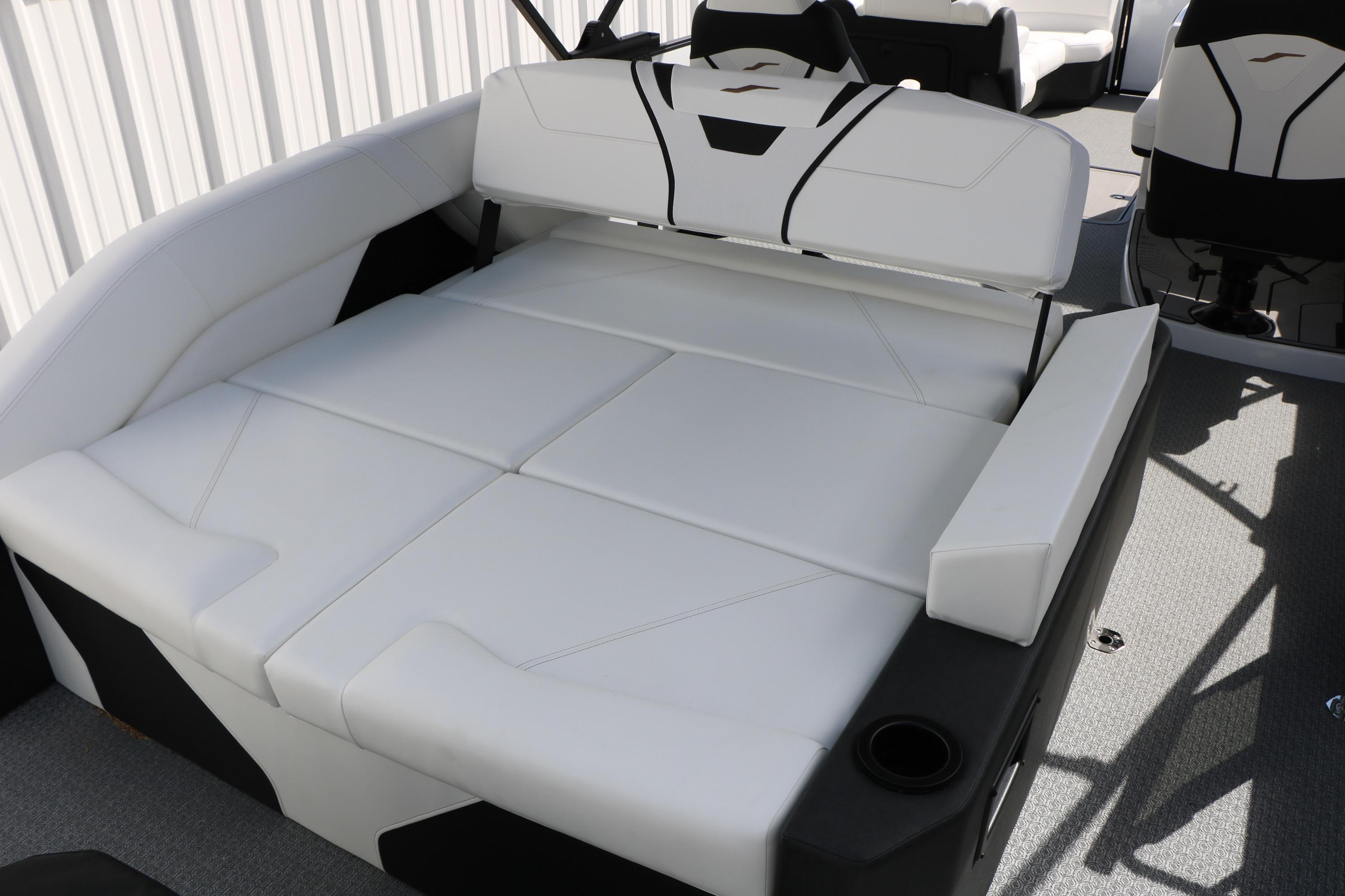 2026 Evotti 725 CS Tri-Toon boat interior with luxurious white seating and modern design.