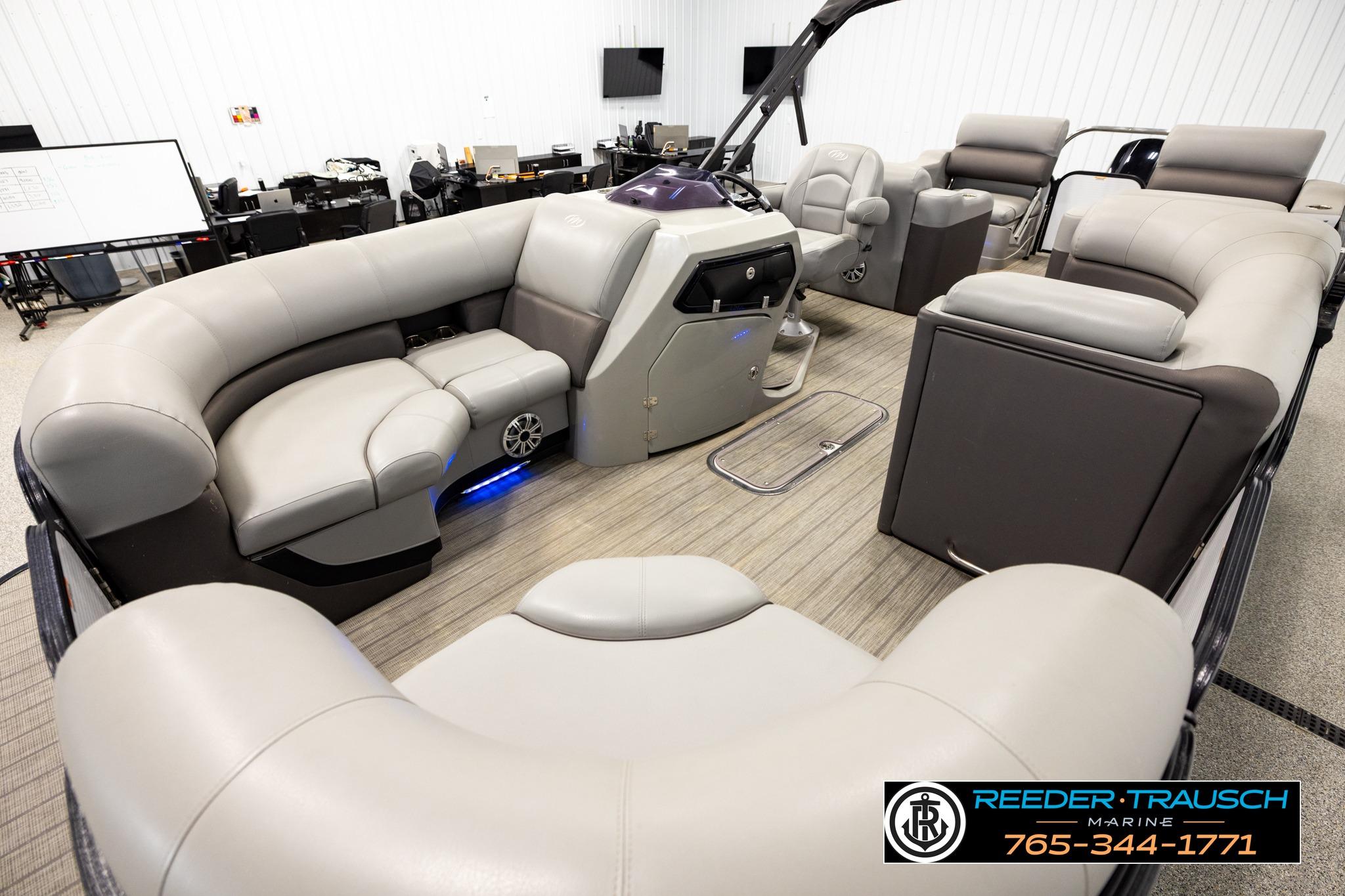 2019 Manitou Oasis SR VP pontoon boat interior with luxurious seating and modern design.