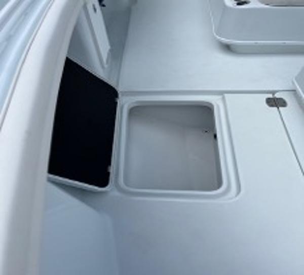 Open storage compartment on 2022 Yellowfin 39 Offshore boat deck.