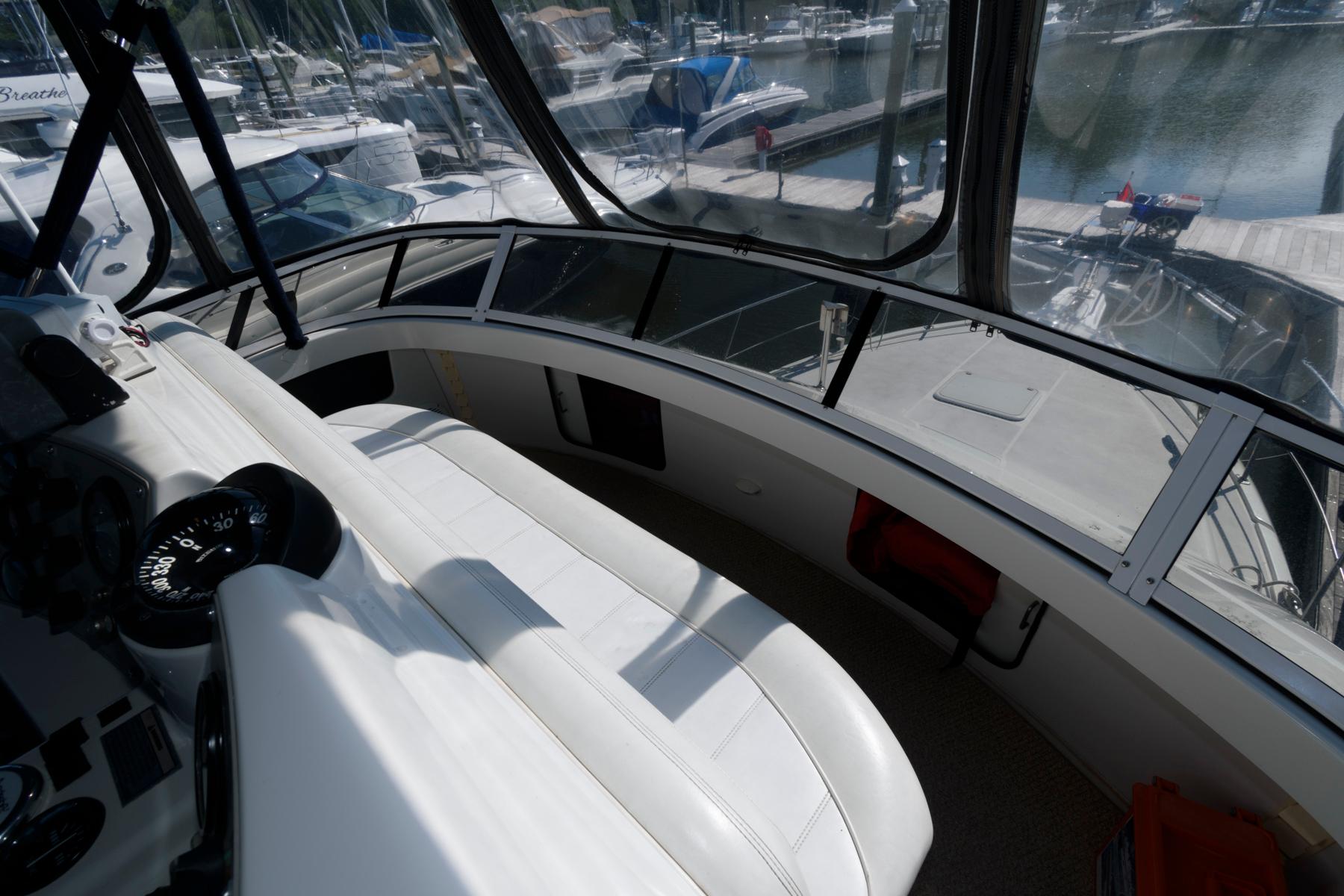 Interior of a 1997 Carver 400 Cockpit Motor Yacht in harbor.