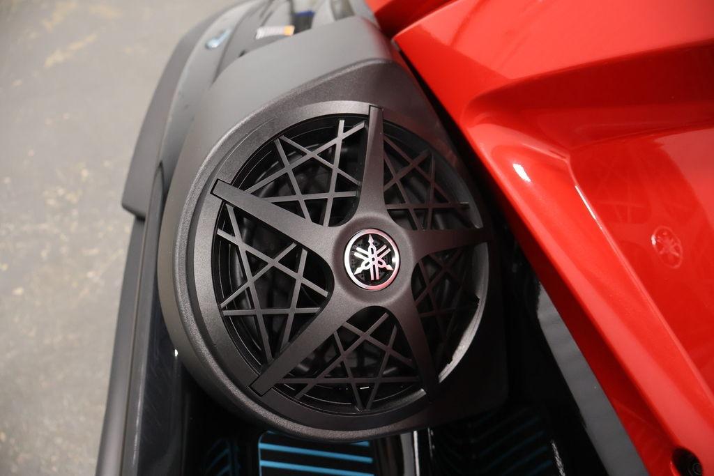 2026 Yamaha WaveRunner VX Deluxe speaker detail with sleek red and black design.