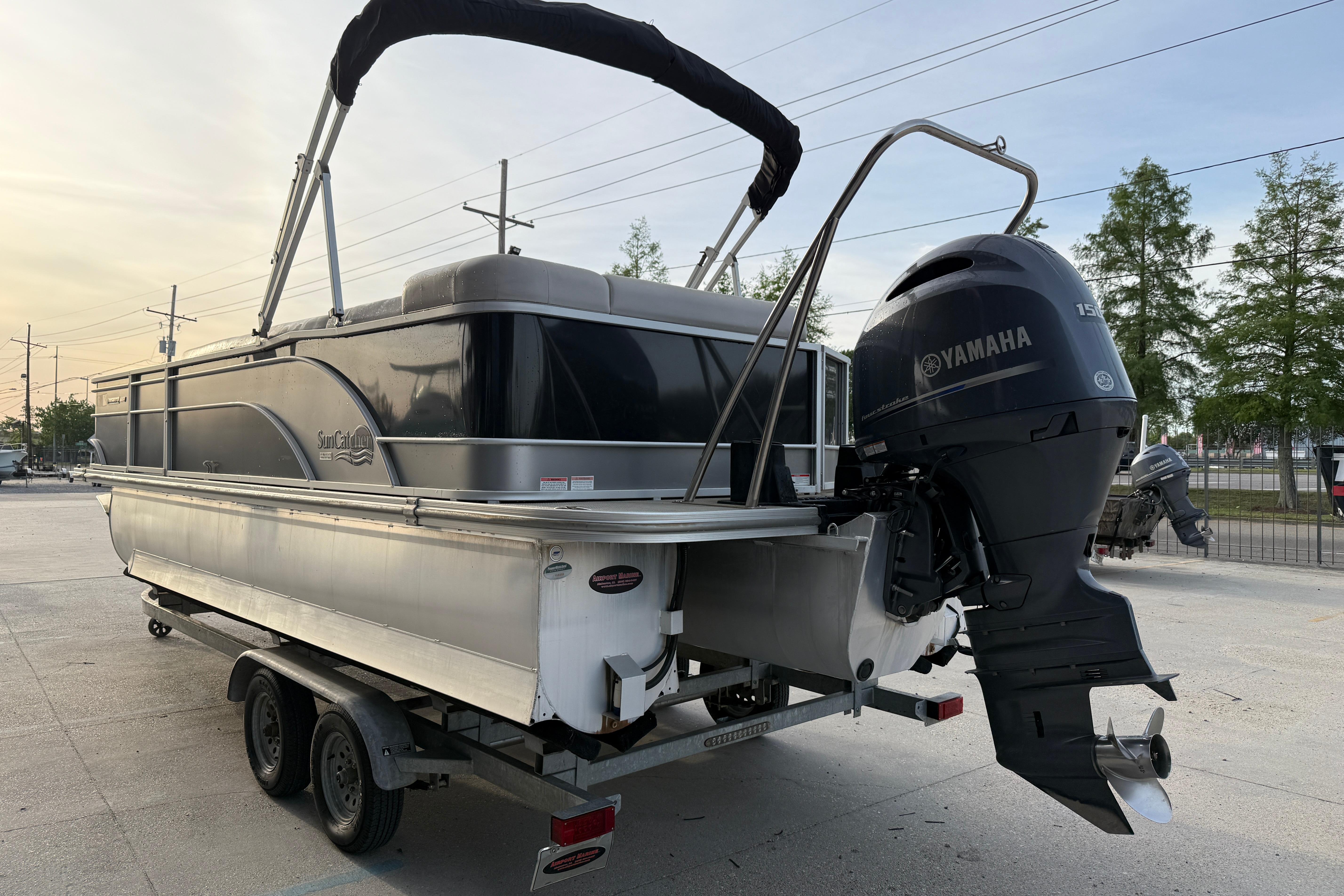 2022 Custom G3 Suncatcher 322FC pontoon boat with Yamaha outboard motor on trailer.
