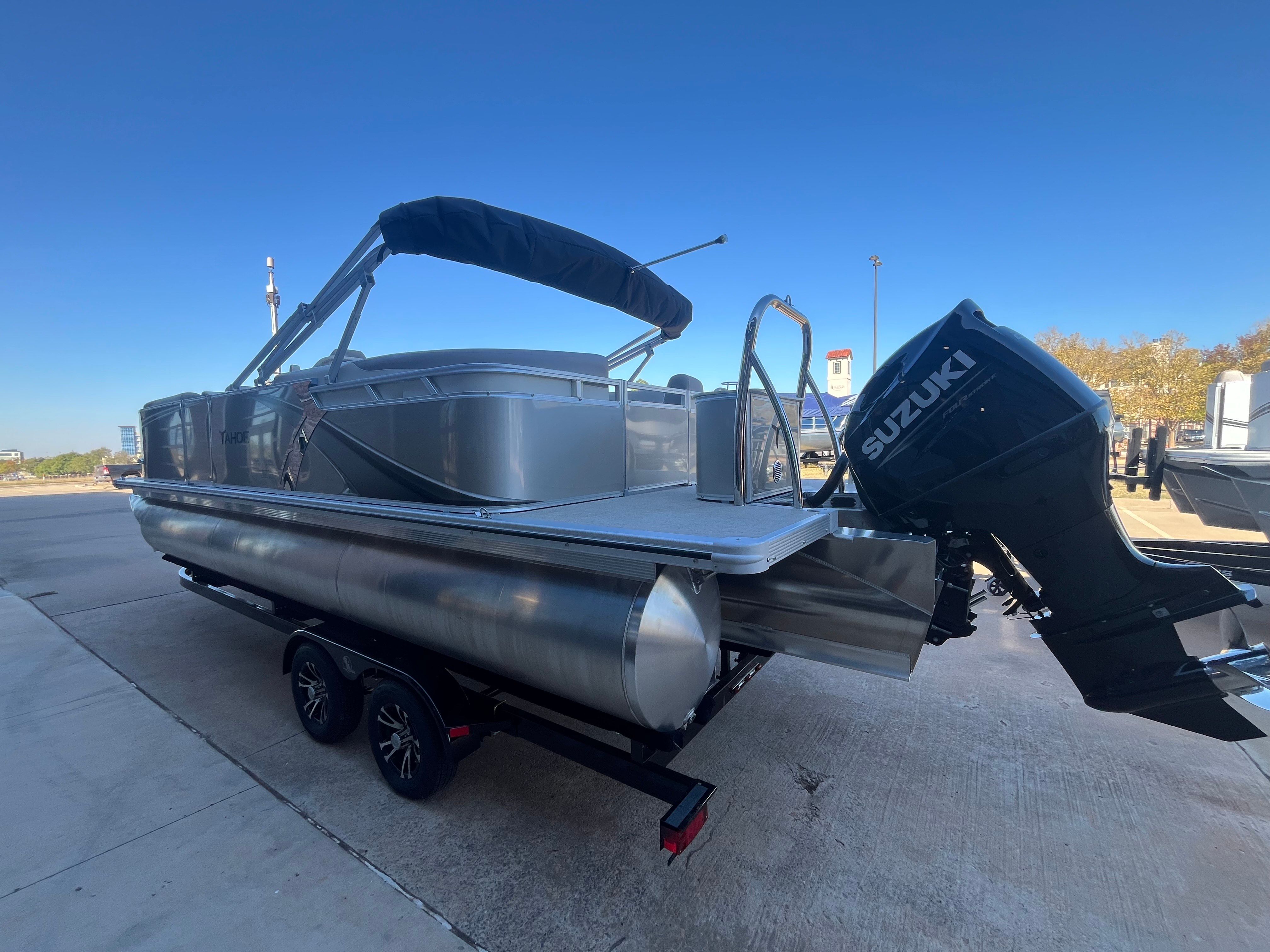2026 Tahoe 2385 LTZ Quad Lounger pontoon boat with Suzuki engine.