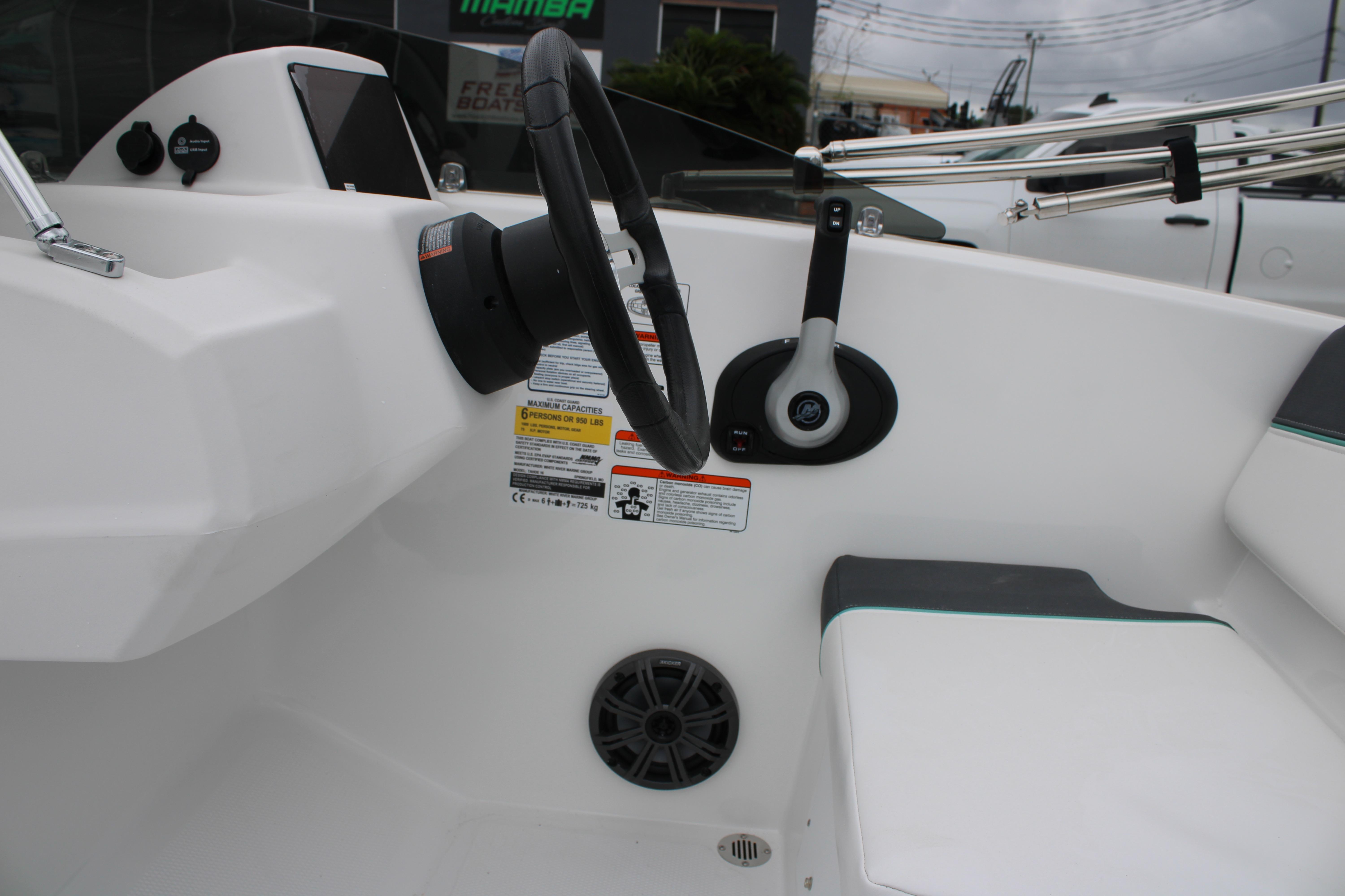 2026 Tahoe T16 boat interior with steering wheel and control panel.
