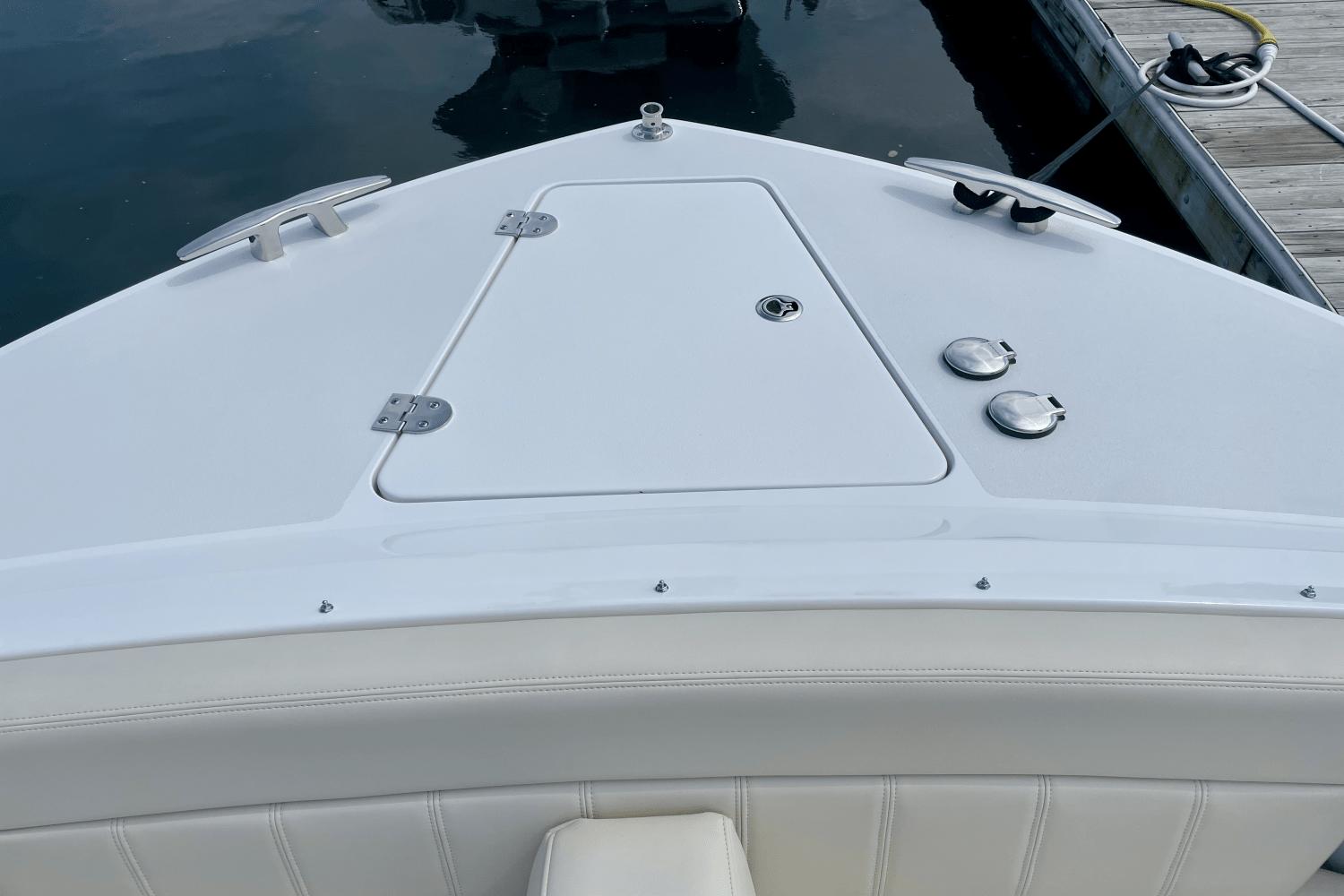 2024 MJM 4 boat bow with sleek white deck and fittings.