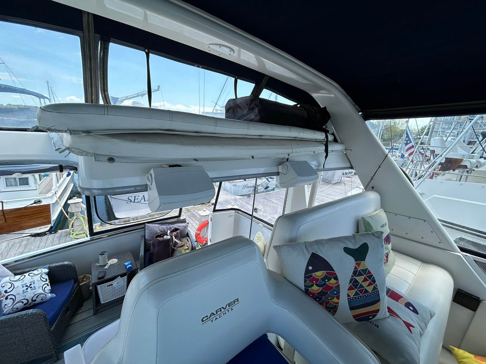 Interior of Carver 356 yacht with cushions and seating area.
