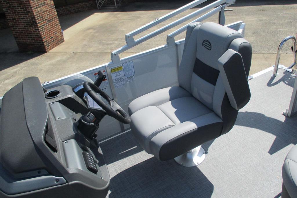 2026 Sun Tracker Party Barge 18 DLX helm with comfortable captain's chair and steering console.
