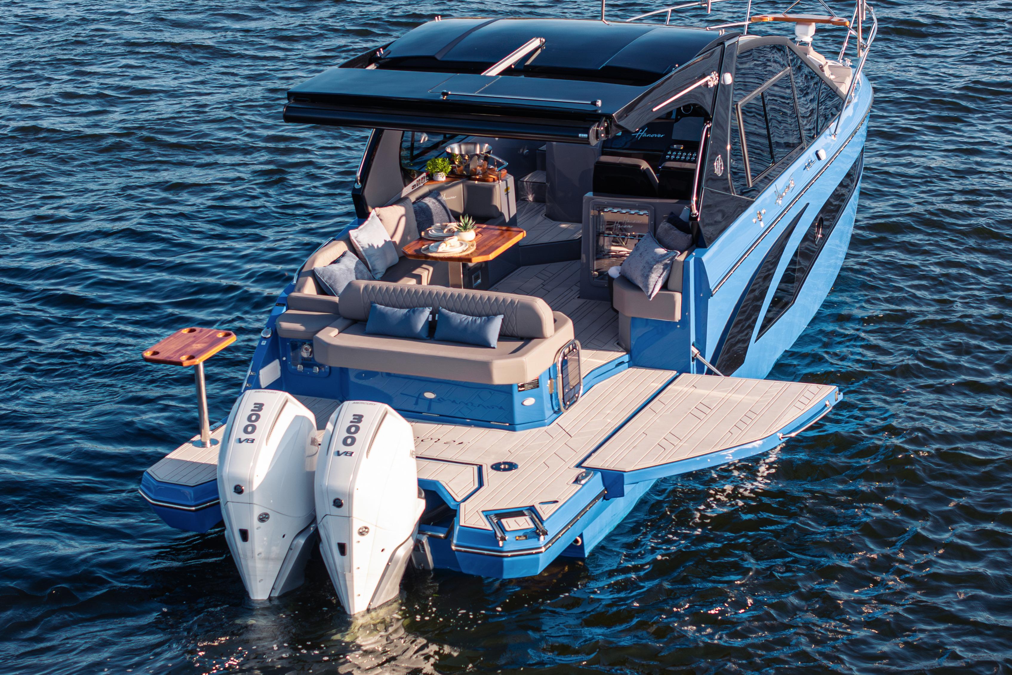 Luxurious 2026 Hanover 347 yacht with spacious deck and twin engines on open water.