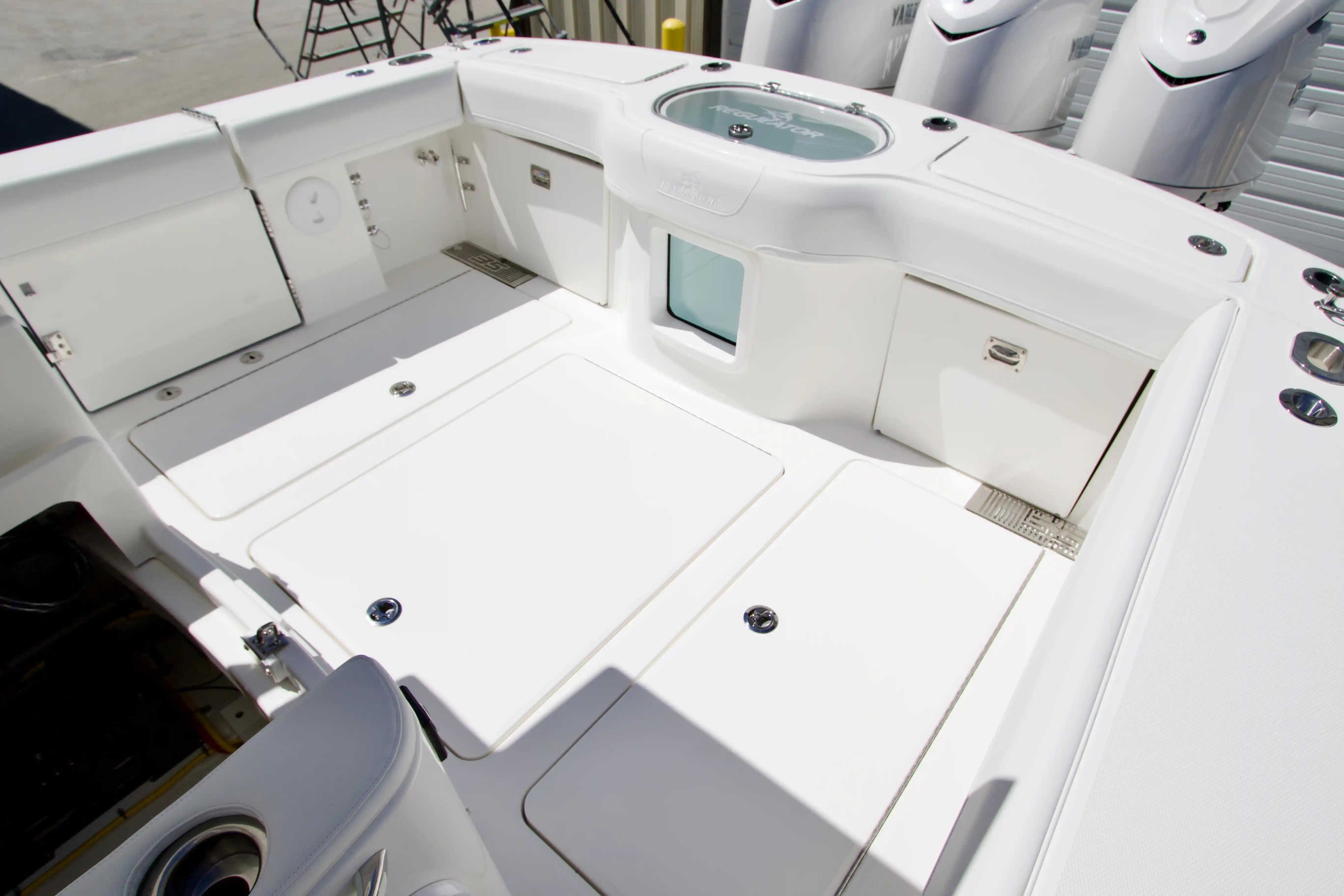 2027 Regulator 35 boat deck with storage compartments and sleek design.