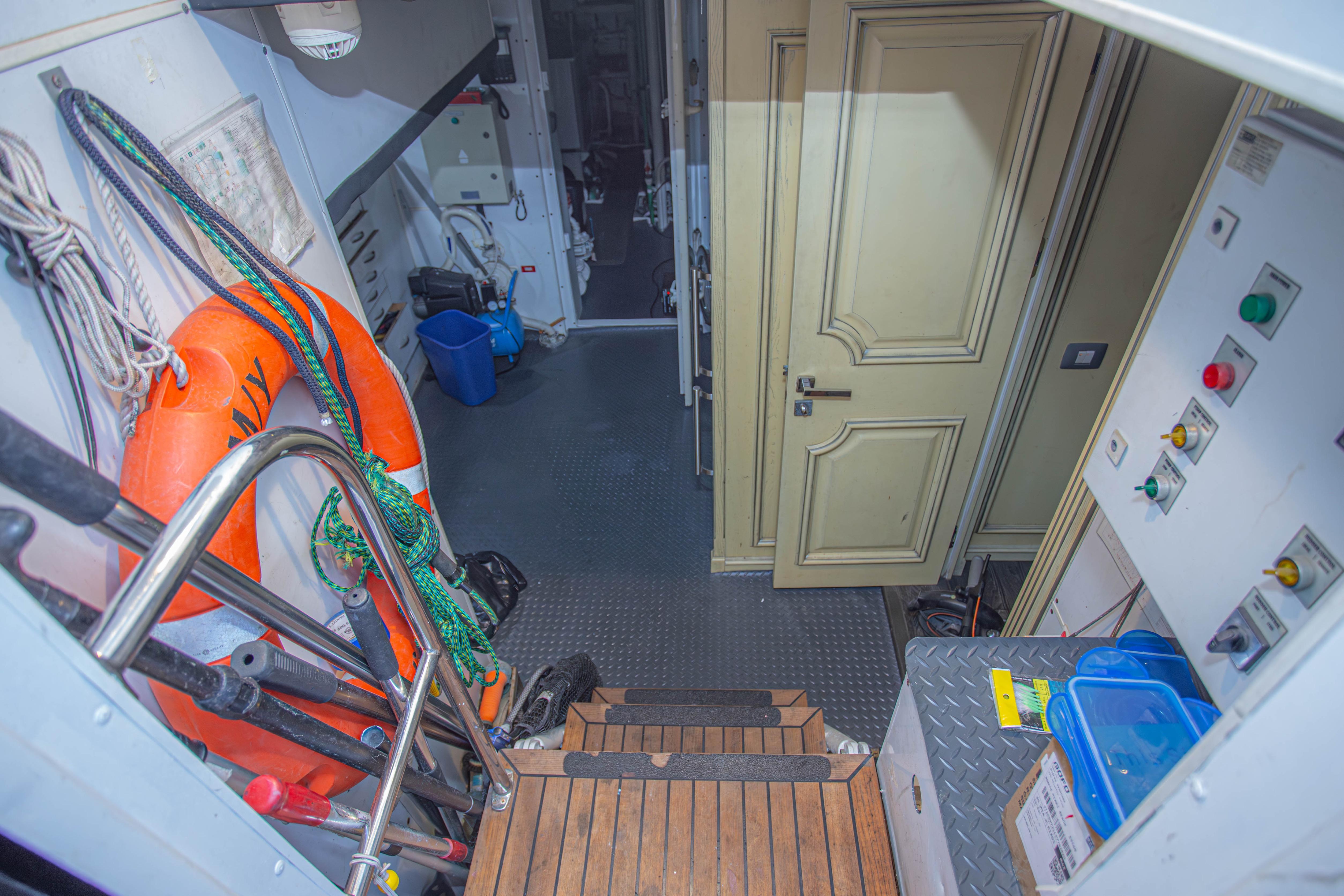 Interior of 2014 Fifth Ocean Yachts 24m Explorer Yacht, featuring equipment and safety gear.