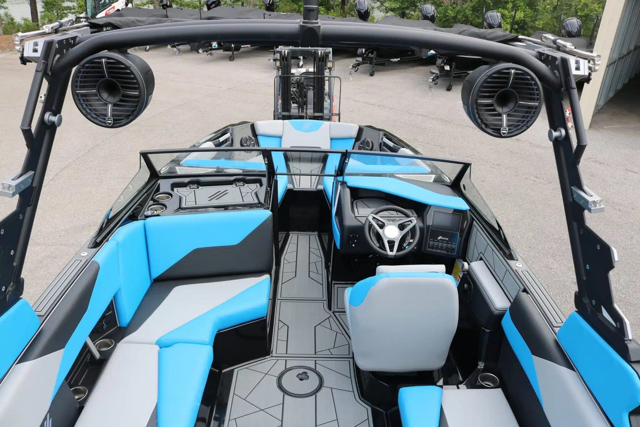 Interior of 2024 ATX Surf Boats 24 Type-S with blue seating.
