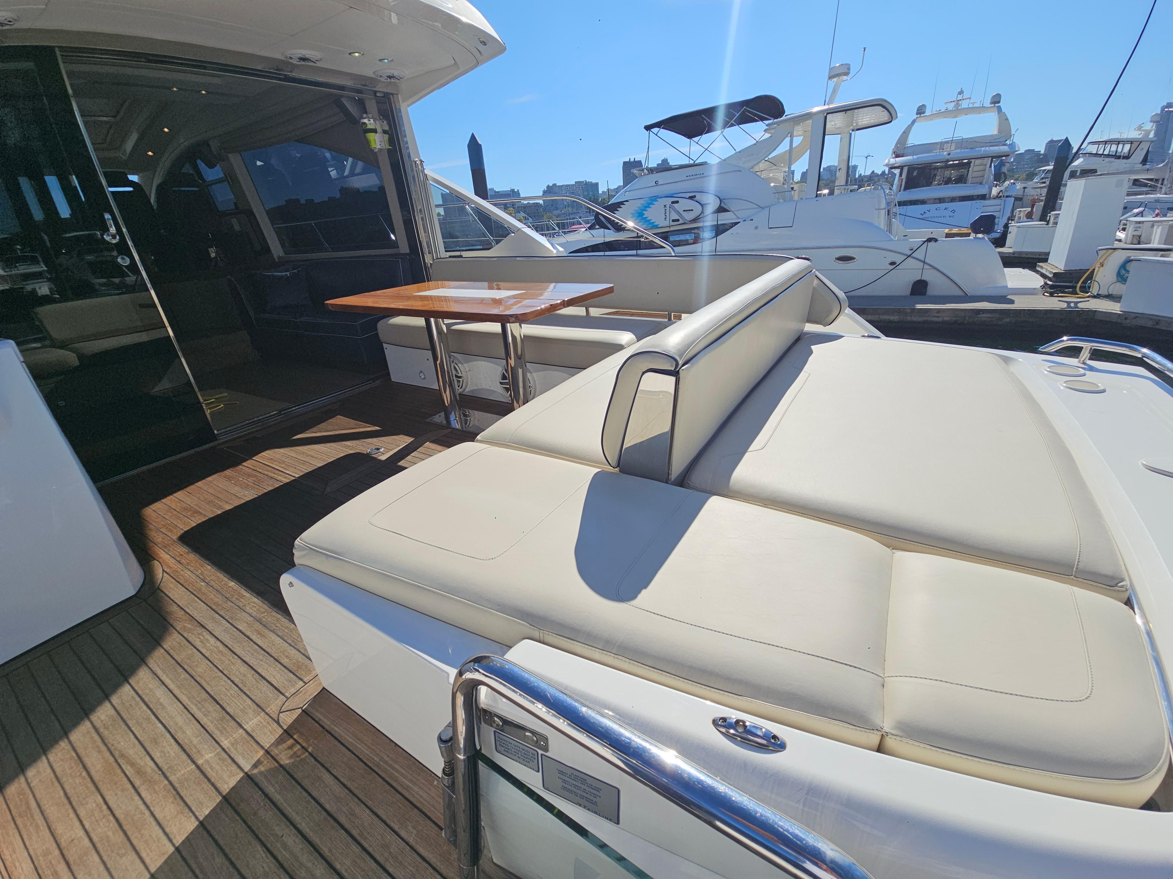 Luxury 2016 Fairline Targa 53 GT yacht with spacious deck and seating area.