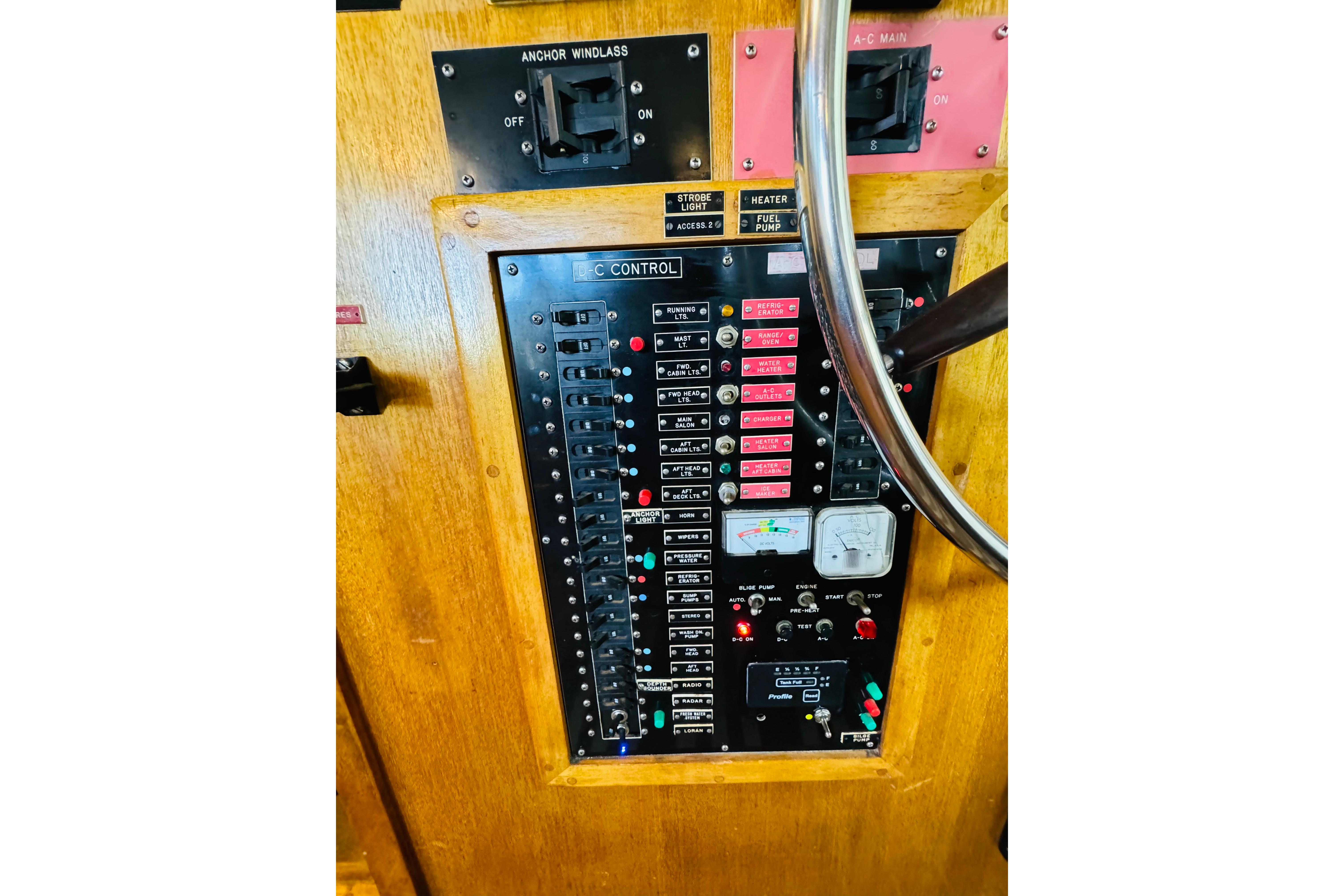 Electrical control panel of a 1978 Californian 42 LRC boat, featuring switches and gauges.